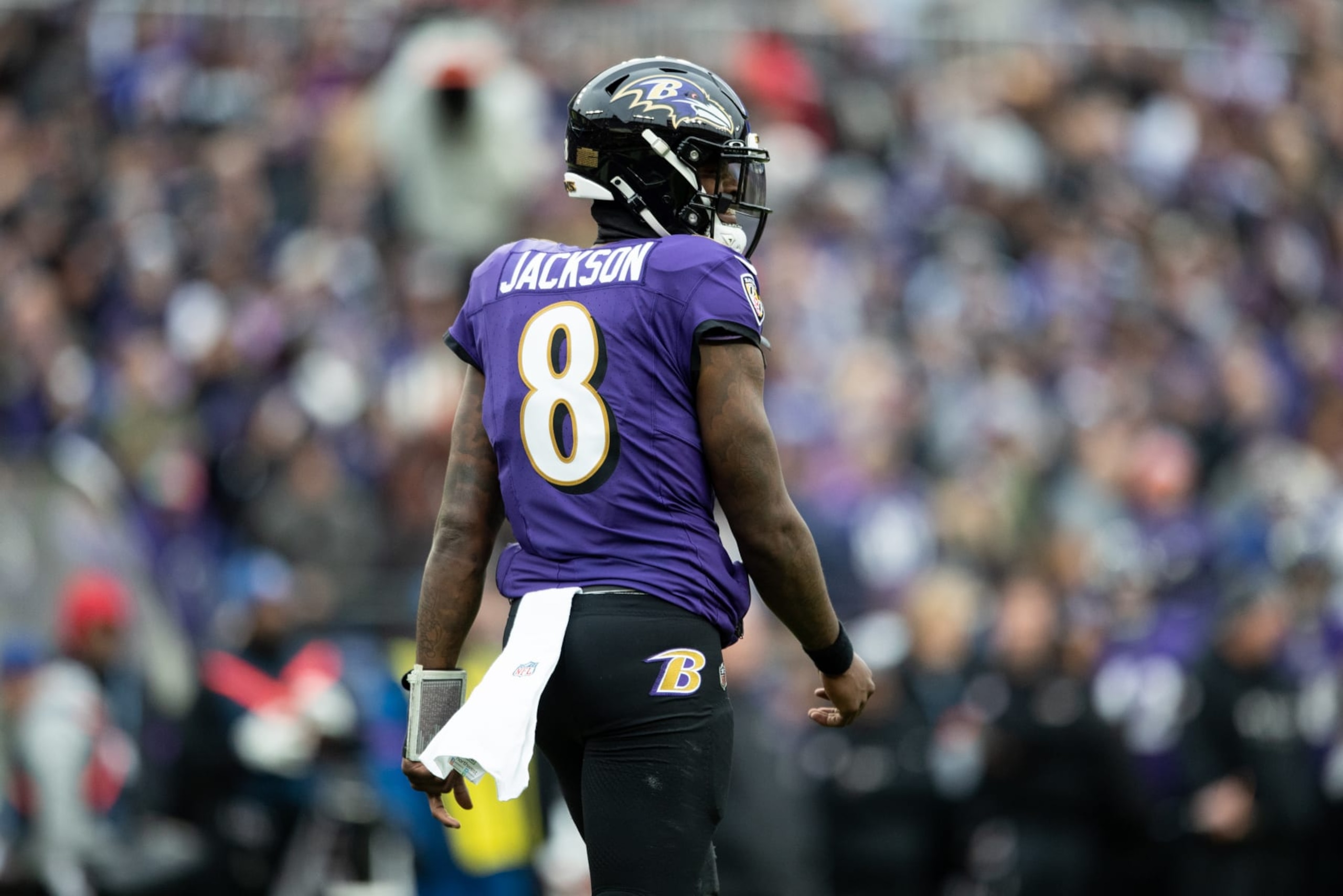 BALTIMORE, MARYLAND - JANUARY 28: Lamar Jackson #8 of the Baltimore Ravens walks between plays during the AFC Championship NFL football game against the Kansas City Chiefs at M&T Bank Stadium on January 28, 2024 in Baltimore, Maryland. (Photo by Kara Durrette/Getty Images) BALTIMORE, MARYLAND - JANUARY 28: Lamar Jackson #8 of the Baltimore Ravens walks between plays during the AFC Championship NFL football game against the Kansas City Chiefs at M&T Bank Stadium on January 28, 2024 in Baltimore, Maryland. (Photo by Kara Durrette/Getty Images)