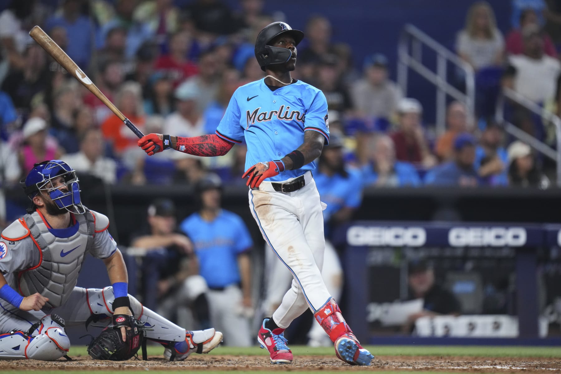 MIAMI, FLORIDA - JULY 21: Jazz Chisholm Jr. #2 of the Miami Marlins hits a home run against the New York Mets during the fourth inning at loanDepot park on July 21, 2024 in Miami, Florida. (Photo by Rich Storry/Getty Images)