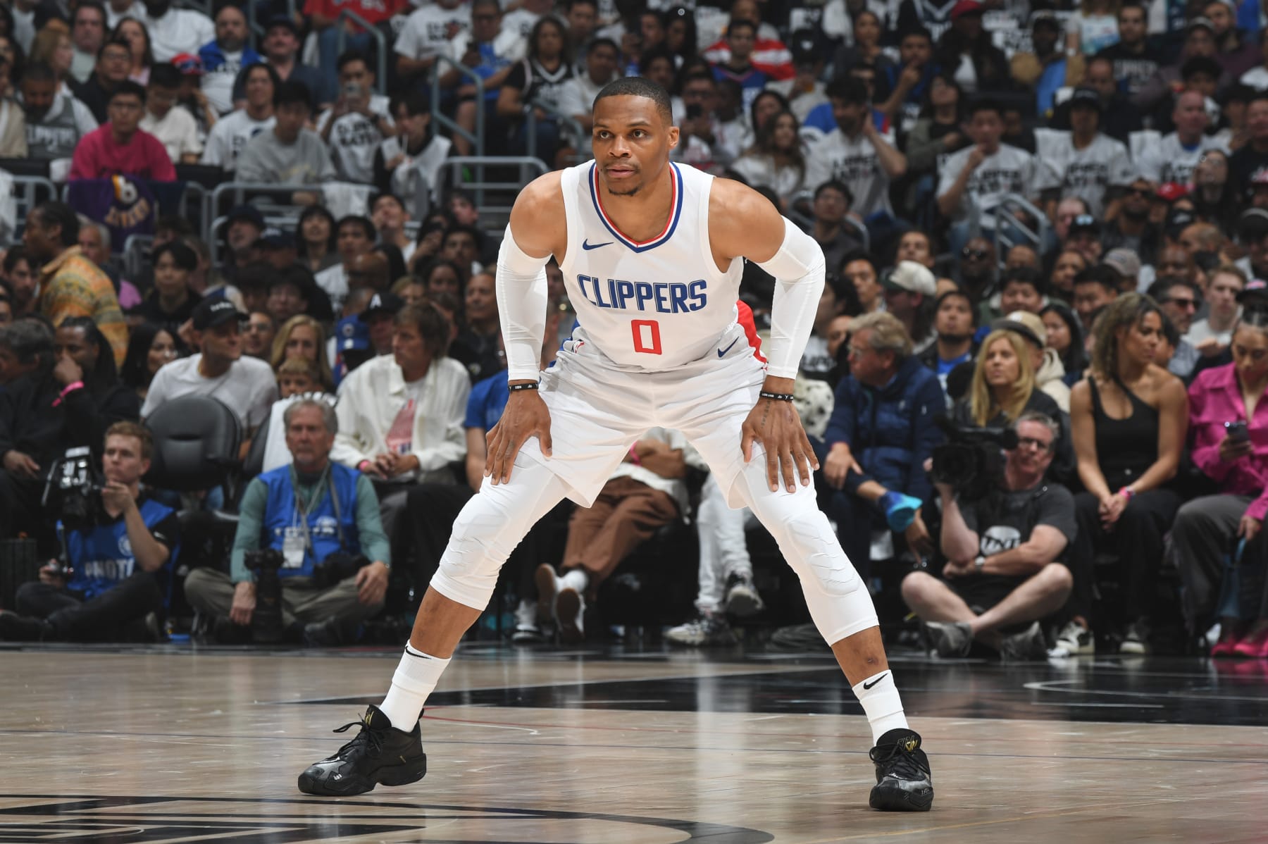 LOS ANGELES, CA - MAY 1: Russell Westbrook #0 of the LA Clippers looks on during the game against the Dallas Mavericks during Round 1 Game 5 of the 2024 NBA Playoffs on May 1, 2024 at Crypto.Com Arena in Los Angeles, California. NOTE TO USER: User expressly acknowledges and agrees that, by downloading and/or using this Photograph, user is consenting to the terms and conditions of the Getty Images License Agreement. Mandatory Copyright Notice: Copyright 2024 NBAE (Photo by Andrew D. Bernstein/NBAE via Getty Images)