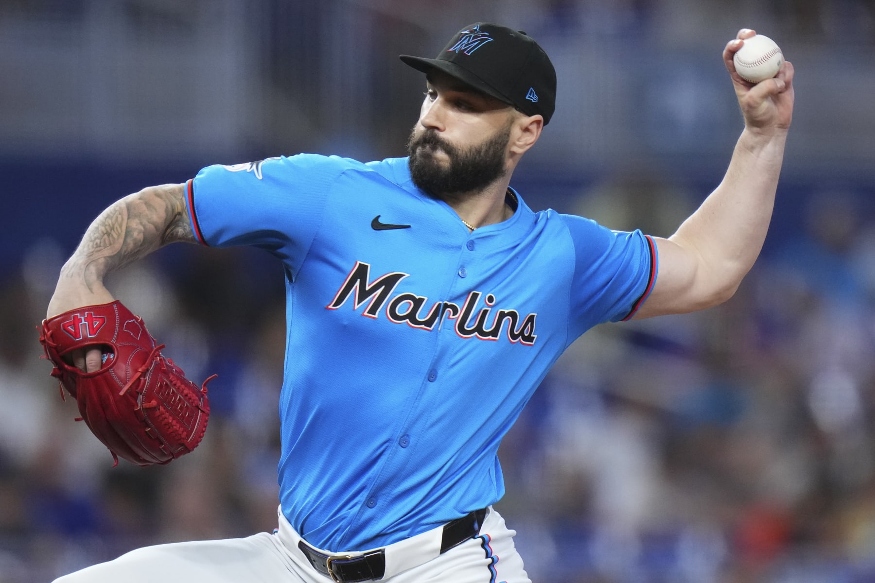 MIAMI, FLORIDA - JULY 21: Tanner Scott #66 of the Miami Marlins throws a pitch against the New York Mets during the ninth inning at loanDepot park on July 21, 2024 in Miami, Florida. (Photo by Rich Storry/Getty Images)