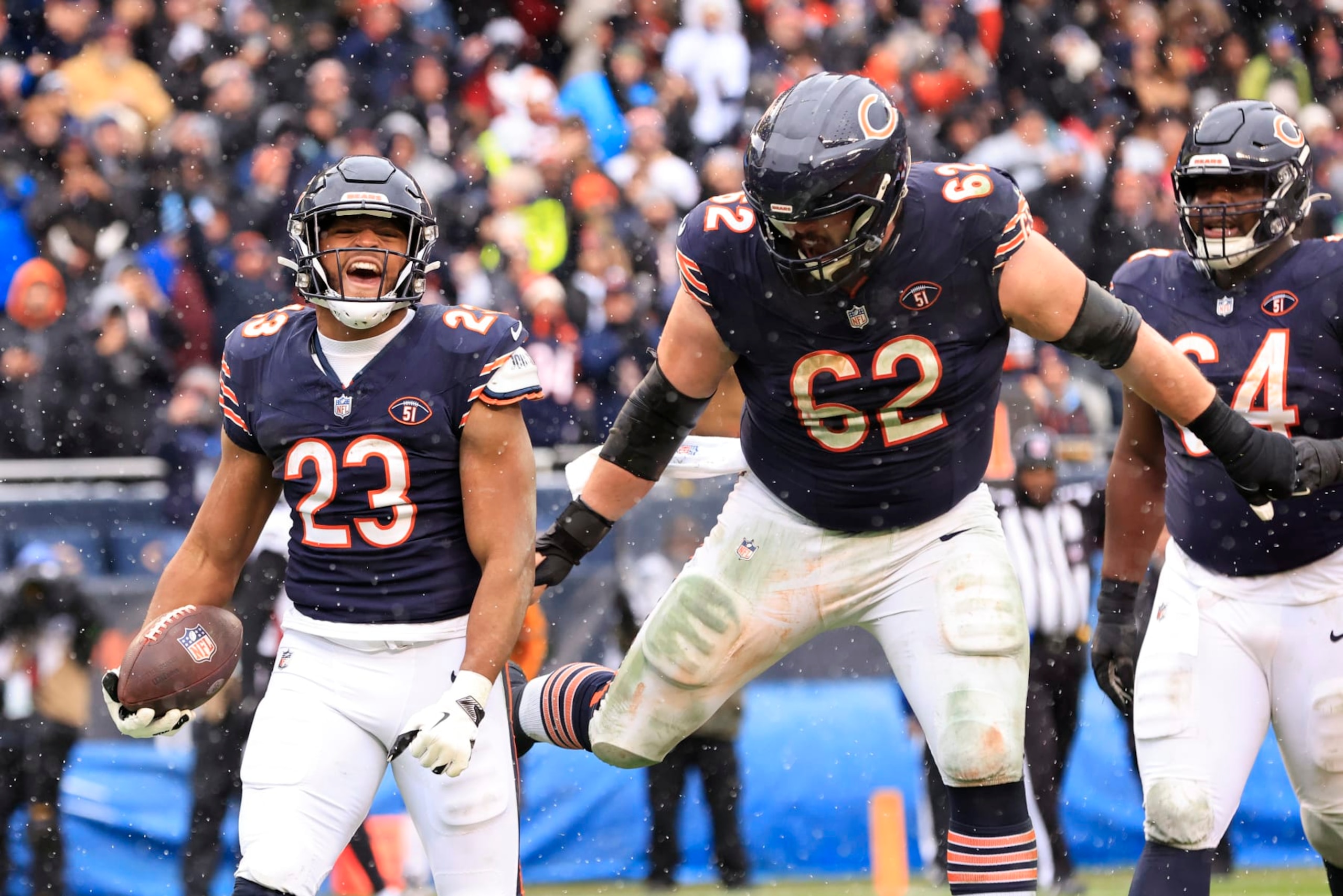 CHICAGO, ILLINOIS - DECEMBER 31: Roschon Johnson #23 of the Chicago Bears celebrates after a touchdown with Lucas Patrick #62 in the game against the Atlanta Falcons at Soldier Field on December 31, 2023 in Chicago, Illinois. (Photo by Justin Casterline/Getty Images) CHICAGO, ILLINOIS - DECEMBER 31: Roschon Johnson #23 of the Chicago Bears celebrates after a touchdown with Lucas Patrick #62 in the game against the Atlanta Falcons at Soldier Field on December 31, 2023 in Chicago, Illinois. (Photo by Justin Casterline/Getty Images)