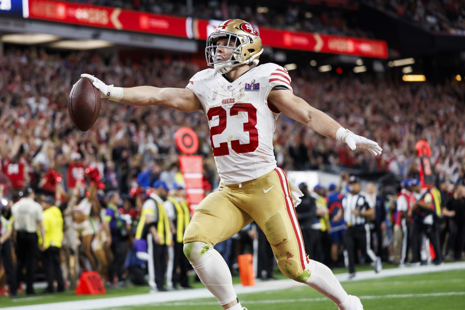 LAS VEGAS, NEVADA - FEBRUARY 11: Christian McCaffrey #23 of the San Francisco 49ers celebrates after scoring a touchdown during Super Bowl LVIII against the Kansas City Chiefs at Allegiant Stadium on February 11, 2024 in Las Vegas, Nevada. (Photo by Ryan Kang/Getty Images)