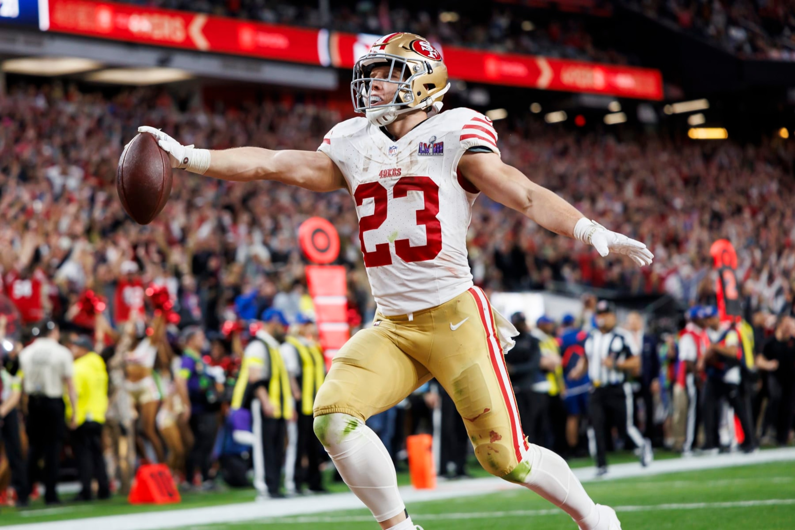 LAS VEGAS, NEVADA - FEBRUARY 11: Christian McCaffrey #23 of the San Francisco 49ers celebrates after scoring a touchdown during Super Bowl LVIII against the Kansas City Chiefs at Allegiant Stadium on February 11, 2024 in Las Vegas, Nevada. (Photo by Ryan Kang/Getty Images)