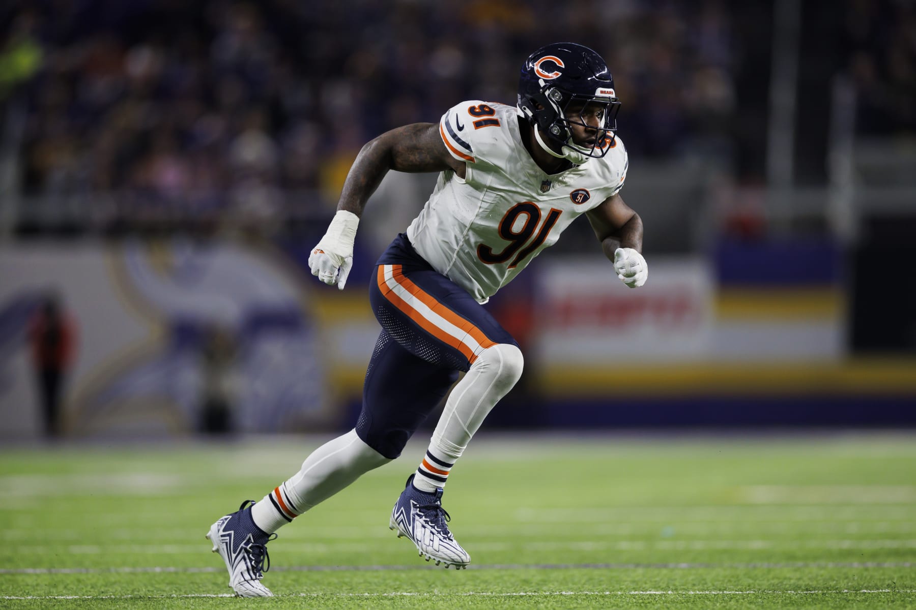 MINNEAPOLIS, MINNESOTA - NOVEMBER 27: Yannick Ngakoue #91 of the Chicago Bears runs around the edge during an NFL football game against the Minnesota Vikings at U.S. Bank Stadium on November 27, 2023 in Minneapolis, Minnesota. (Photo by Ryan Kang/Getty Images)