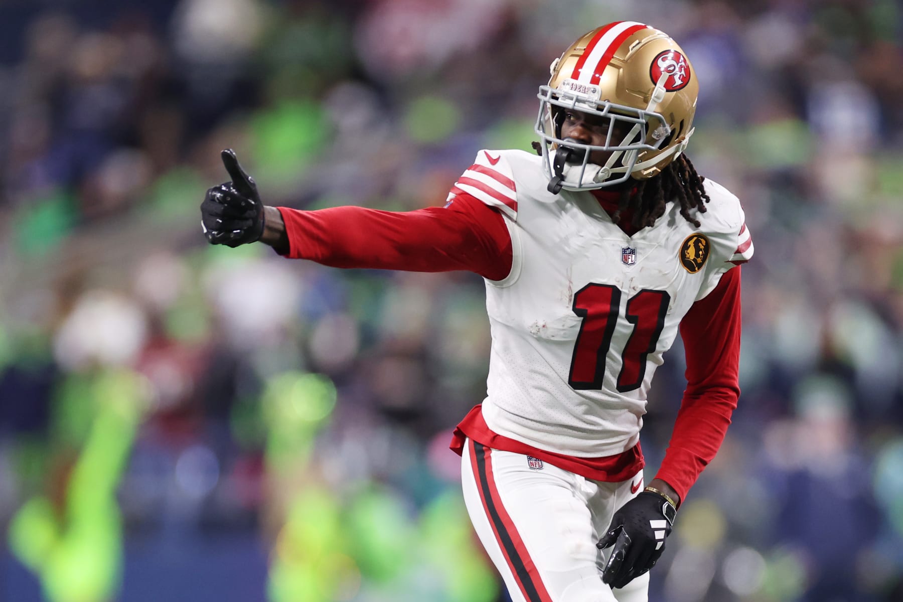 SEATTLE, WASHINGTON - NOVEMBER 23: Brandon Aiyuk #11 of the San Francisco 49ers looks on during the first half against the Seattle Seahawks at Lumen Field on November 23, 2023 in Seattle, Washington. (Photo by Steph Chambers/Getty Images)