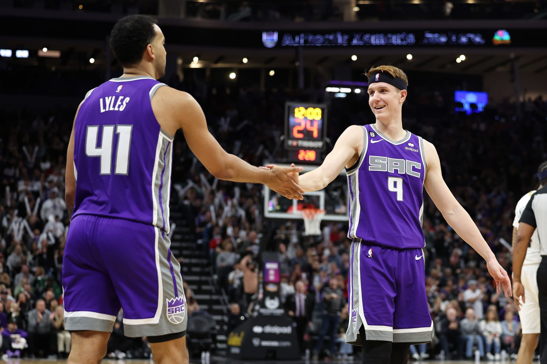 SACRAMENTO, CALIFORNIA - MARCH 06: Kevin Huerter #9 high-fives Trey Lyles #41 of the Sacramento Kings in the second half of their game against the New Orleans Pelicans at Golden 1 Center on March 06, 2023 in Sacramento, California. NOTE TO USER: User expressly acknowledges and agrees that, by downloading and or using this photograph, User is consenting to the terms and conditions of the Getty Images License Agreement.   (Photo by Ezra Shaw/Getty Images)