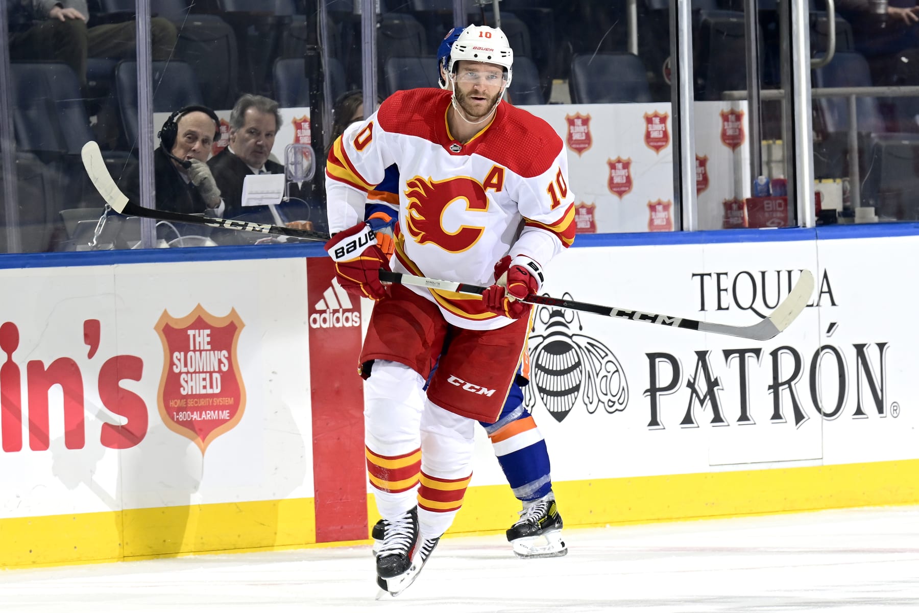 ELMONT, NEW YORK - FEBRUARY 10:  Jonathan Huberdeau #10 of the Calgary Flames skates against the New York Islanders at UBS Arena on February 10, 2024 in Elmont, New York. (Photo by Steven Ryan/NHLI via Getty Images)