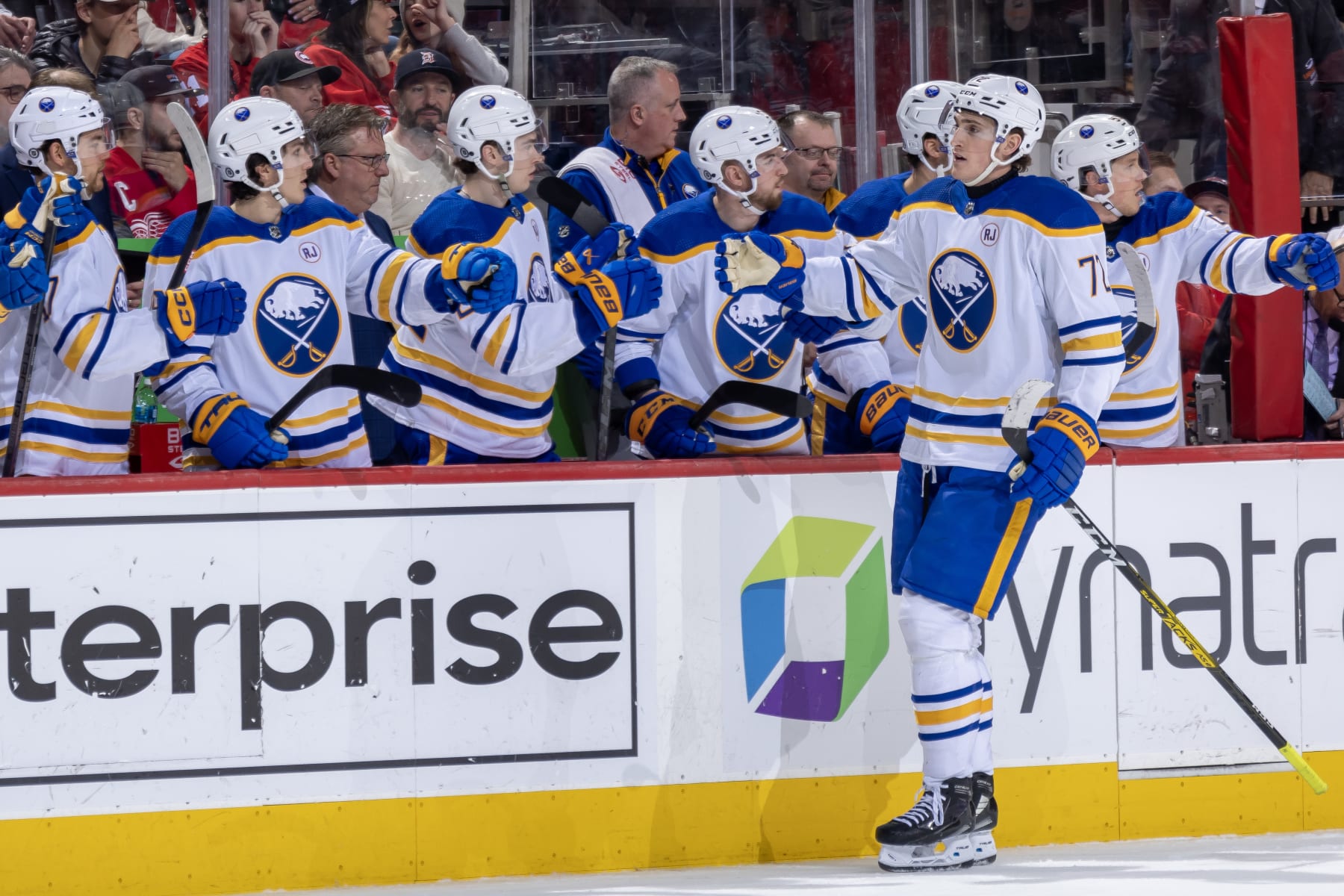 DETROIT, MI - APRIL 07: Tage Thompson #72 of the Buffalo Sabres pounds gloves with teammates on the bench after his goal against the Detroit Red Wings during the first period at Little Caesars Arena on April 7, 2024 in Detroit, Michigan. Detroit defeated Buffalo 3-1. (Photo by Dave Reginek/NHLI via Getty Images)