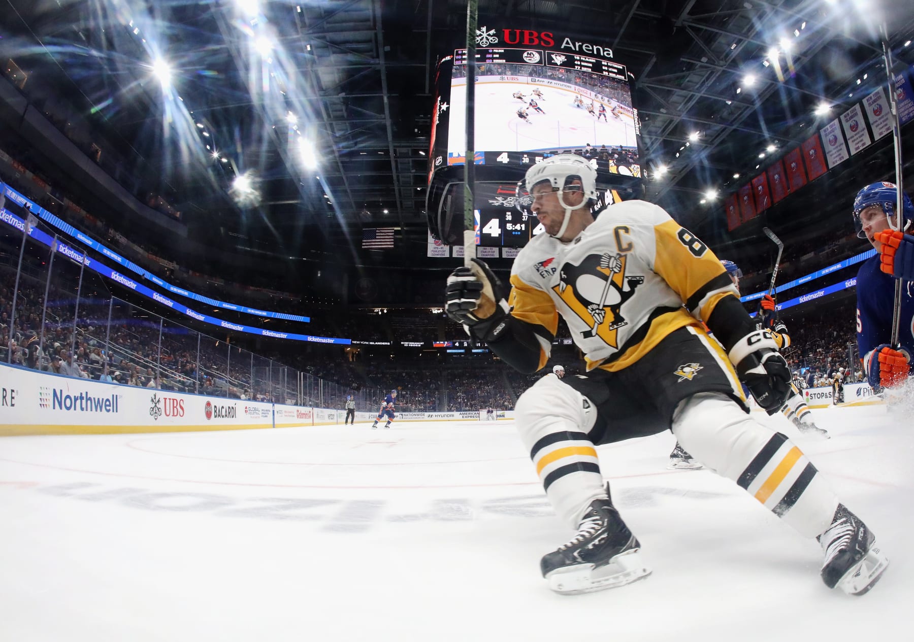 ELMONT, NEW YORK - APRIL 17: Sidney Crosby #87 of the Pittsburgh Penguins skates against the New York Islanders at UBS Arena on April 17, 2024 in Elmont, New York. (Photo by Bruce Bennett/Getty Images)