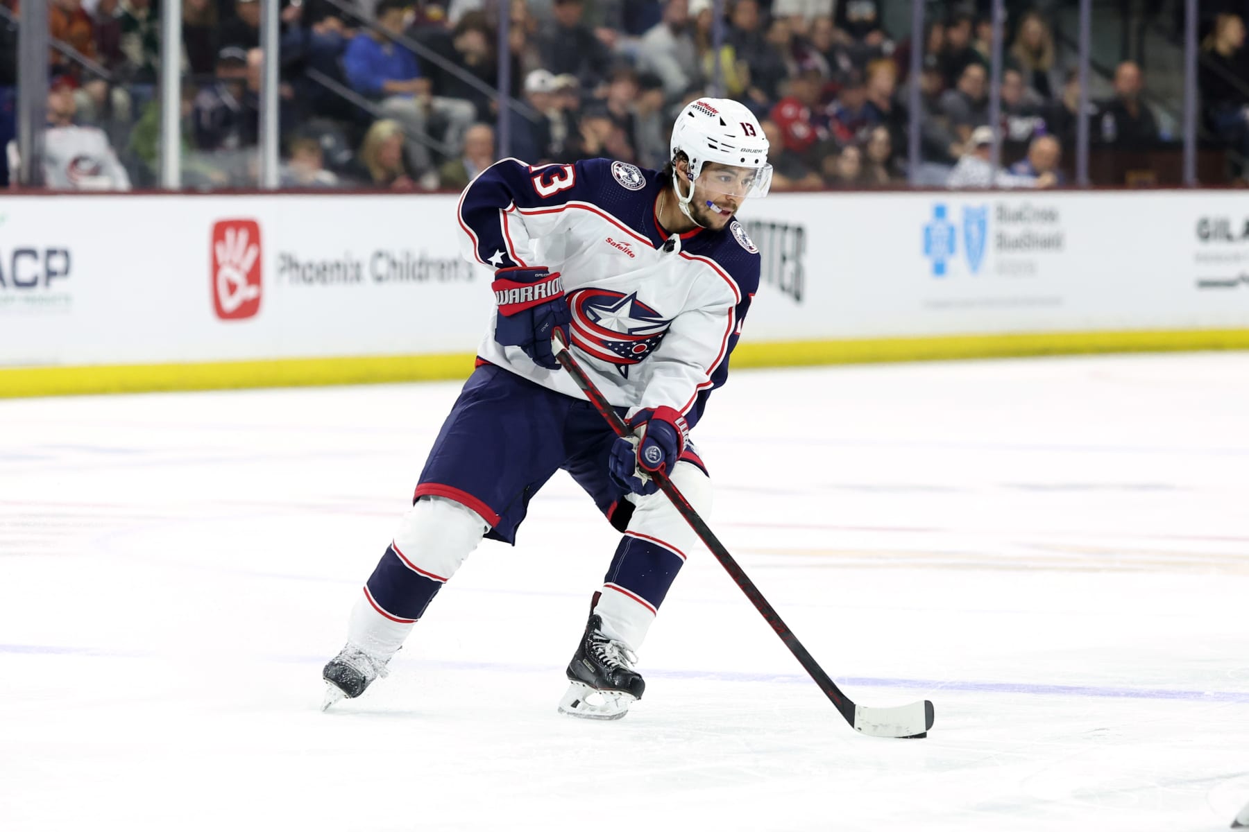 TEMPE, ARIZONA - MARCH 26: Johnny Gaudreau #13 of the Columbus Blue Jackets skates with the puck against the Arizona Coyotes at Mullett Arena on March 26, 2024 in Tempe, Arizona. (Photo by Zac BonDurant/Getty Images)