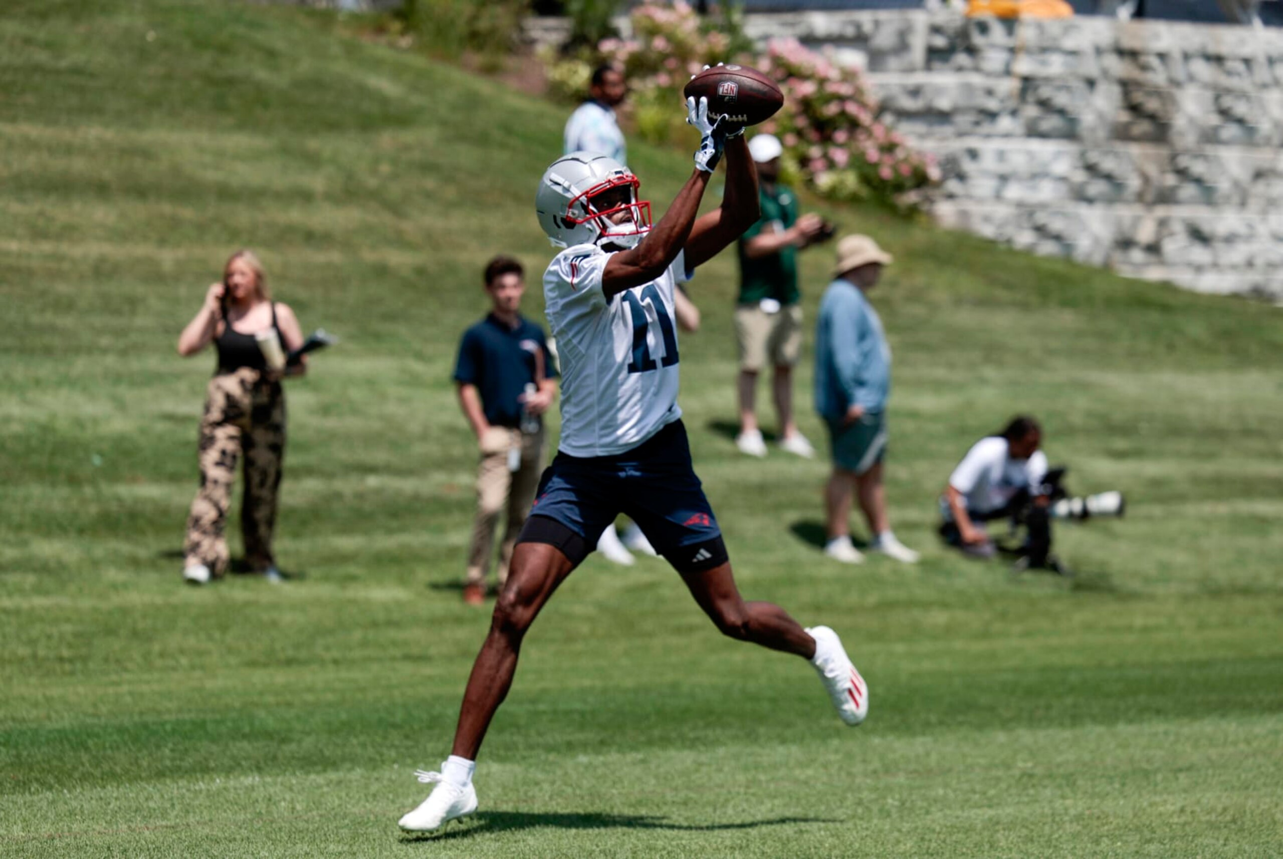 FOXBOROUGH, MA - JUNE 04: New England Patriots wide receiver Tyquan Thornton (11) makes a catch during New England Patriots OTA on June 4, 2024, at Gillette Stadium in Foxborough, Massachusetts. (Photo by Fred Kfoury III/Icon Sportswire via Getty Images)