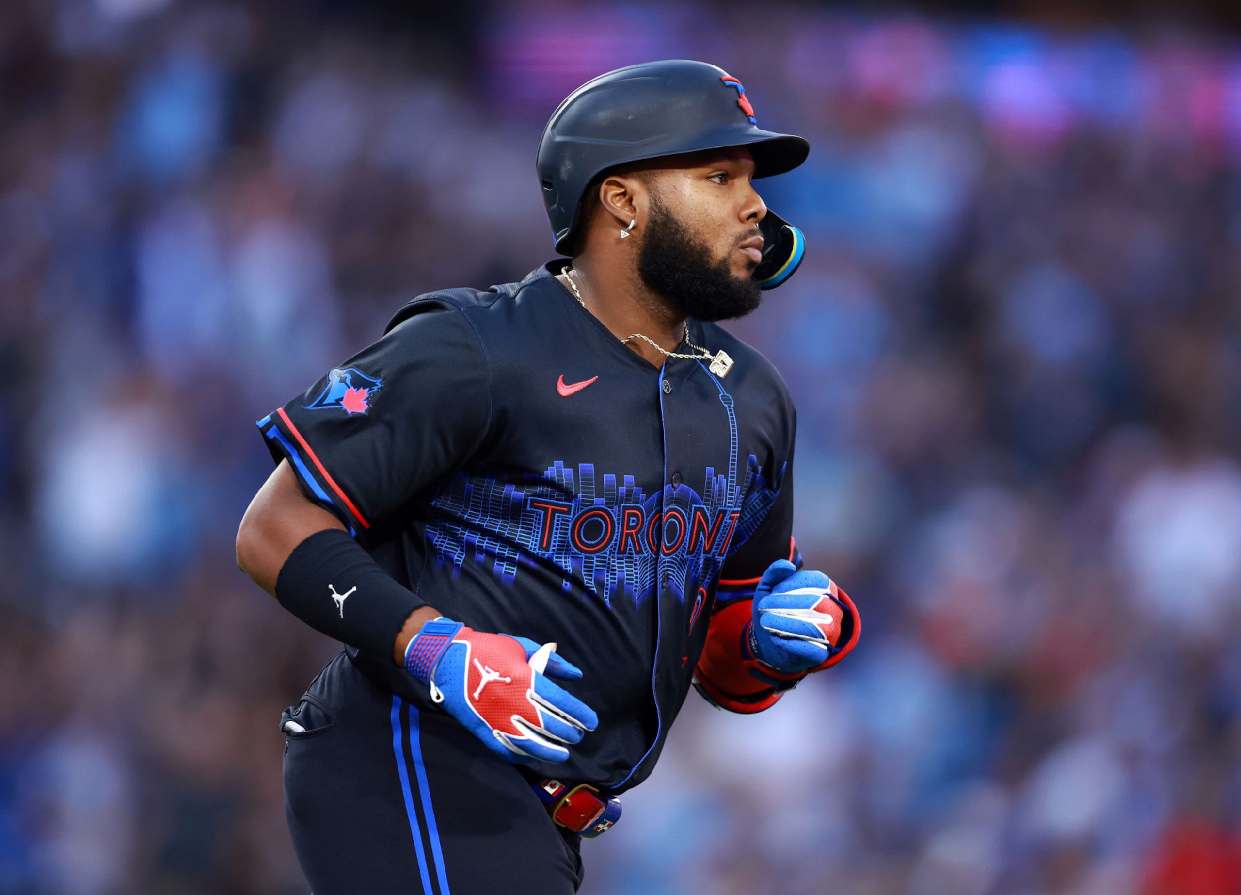 TORONTO, ON - JULY 19:  Vladimir Guerrero Jr. #27 of the Toronto Blue Jays runs the bases after hitting a two-run home run in the sixth inning during a game against the Detroit Tigers at Rogers Centre on July 19, 2024 in Toronto, Ontario, Canada.  (Photo by Vaughn Ridley/Getty Images)