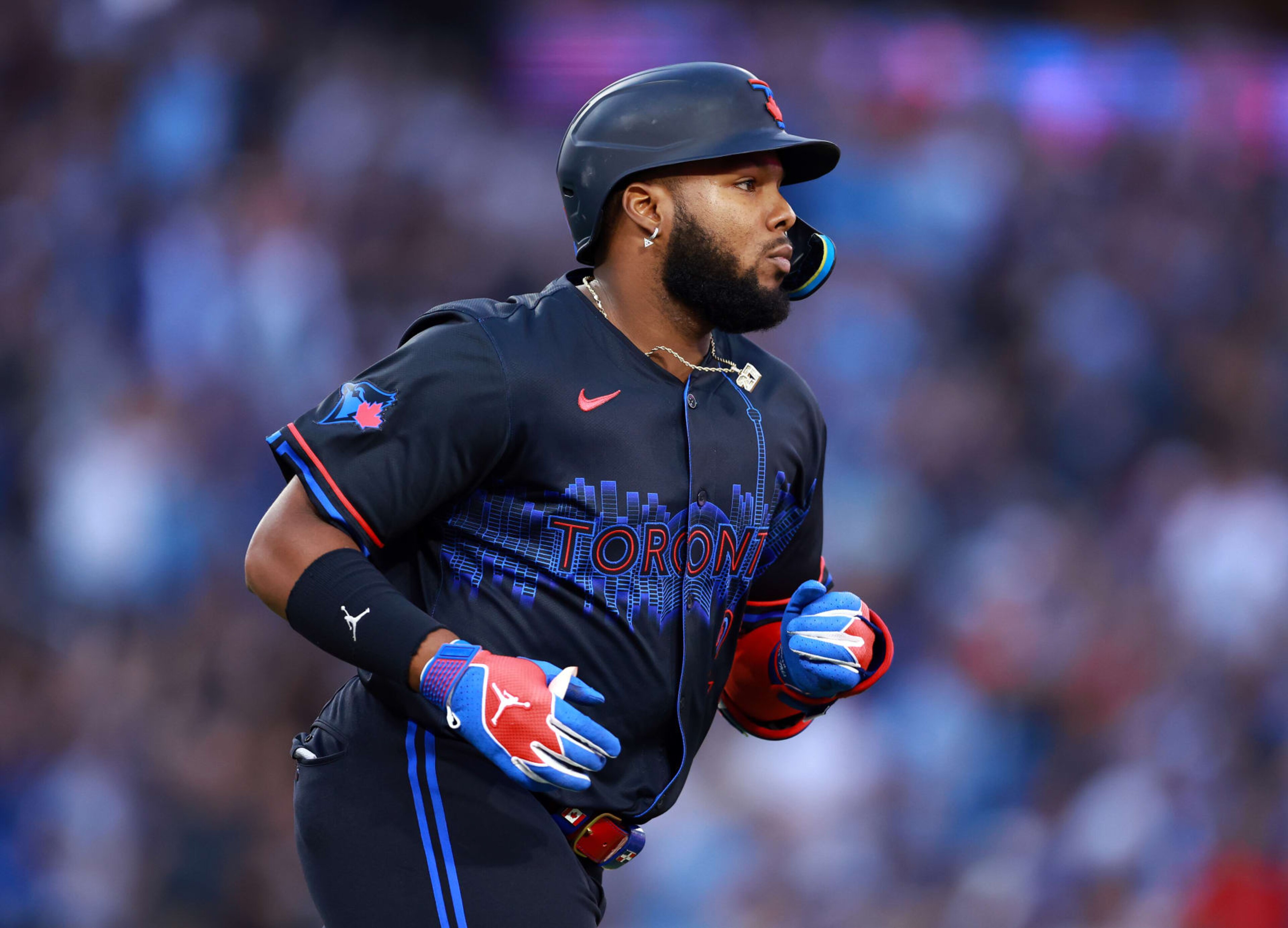 TORONTO, ON - JULY 19:  Vladimir Guerrero Jr. #27 of the Toronto Blue Jays runs the bases after hitting a two-run home run in the sixth inning during a game against the Detroit Tigers at Rogers Centre on July 19, 2024 in Toronto, Ontario, Canada.  (Photo by Vaughn Ridley/Getty Images)