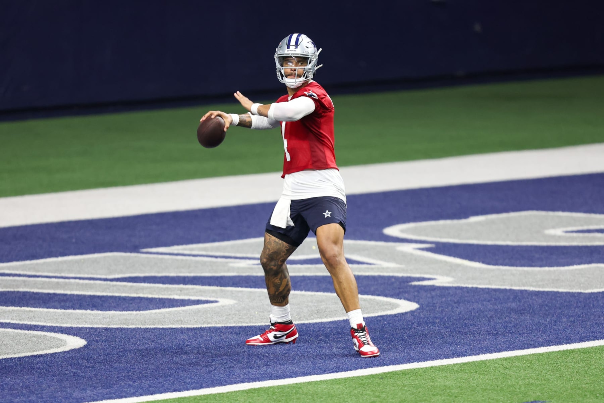 FRISCO, TX - MAY 22: Dallas Cowboys quarterback Dak Prescott (4) passes during the Dallas Cowboys OTAs on May 22, 2024 at The Star in Frisco, TX. (Photo by George Walker/Icon Sportswire via Getty Images)