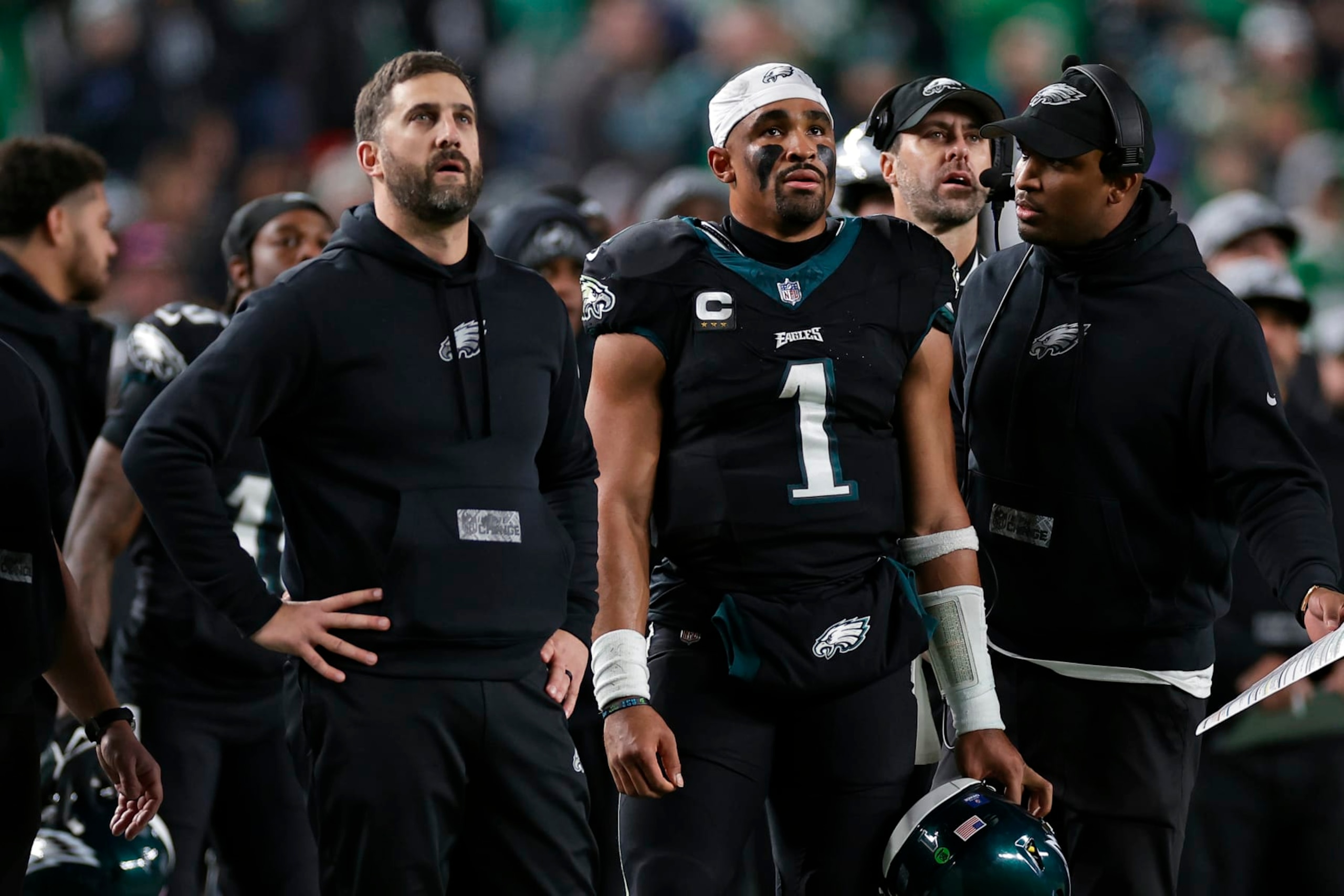 PHILADELPHIA, PENNSYLVANIA - DECEMBER 25: Philadelphia Eagles head coach Nick Sirianni and Jalen Hurts #1 of the Philadelphia Eagles look on against the New York Giants at Lincoln Financial Field on December 25, 2023 in Philadelphia, Pennsylvania. (Photo by Adam Hunger/Getty Images)