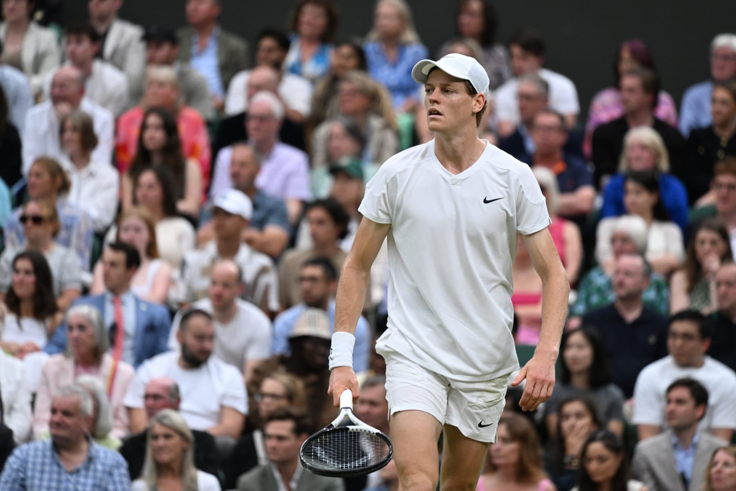 LONDON, ENGLAND - JULY 09: Jannik Sinner of Italy plays against Daniil Medvedev in the Gentlemen's Singles Quarter Final match during day nine of The Championships Wimbledon 2024 at All England Lawn Tennis and Croquet Club on July 09, 2024 in London, England. (Photo by Stringer/Anadolu via Getty Images)