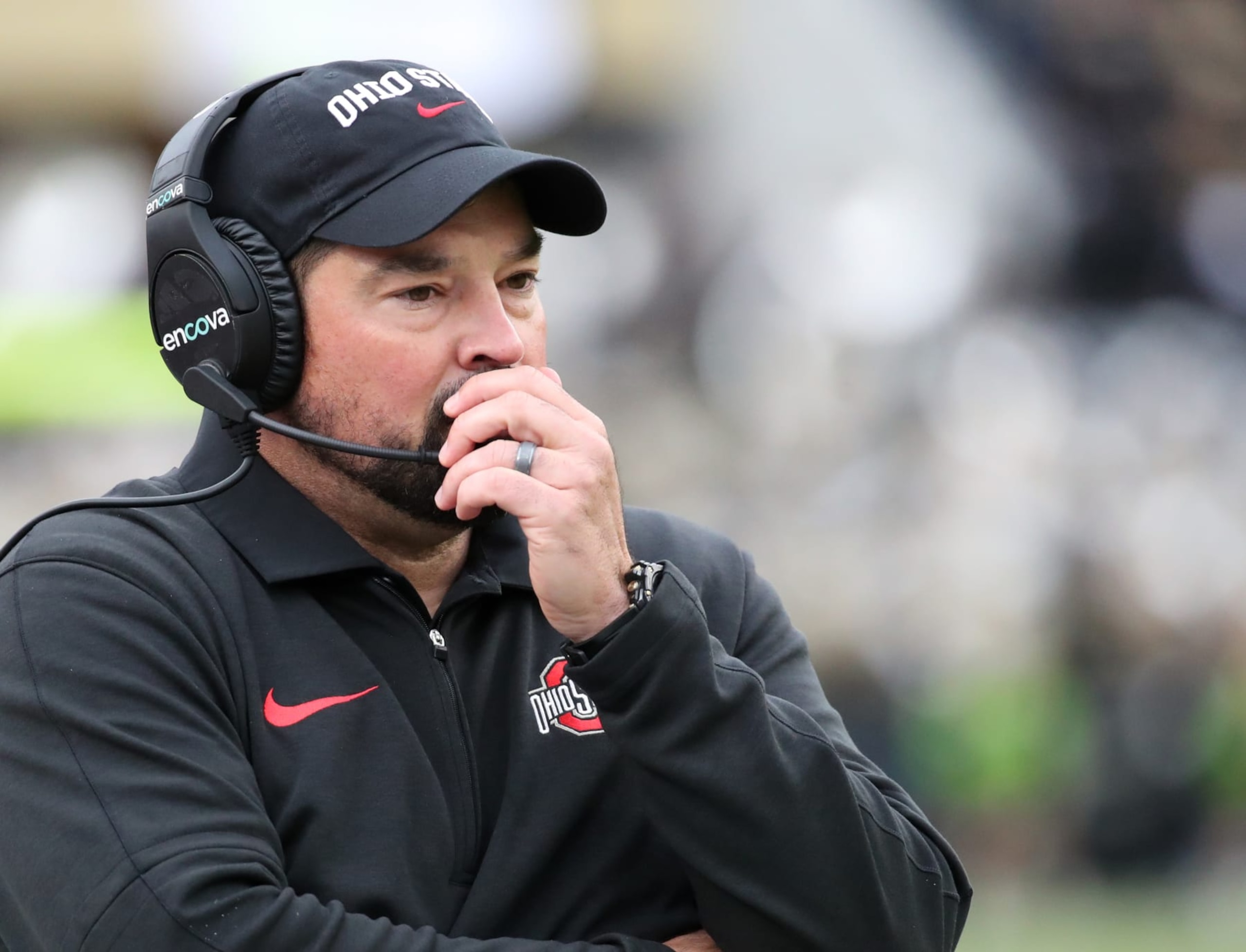 WEST LAFAYETTE, INDIANA - OCTOBER 14: Head Coach Ryan Day of the Ohio State University Buckeyes talks to his coaches on his headset during a timeout in the second quarter against the Purdue Boilermakers at Ross-Ade Stadium on October 14, 2023 in West Lafayette, Indiana. (Photo by Bruce Yeung/Getty Images)
