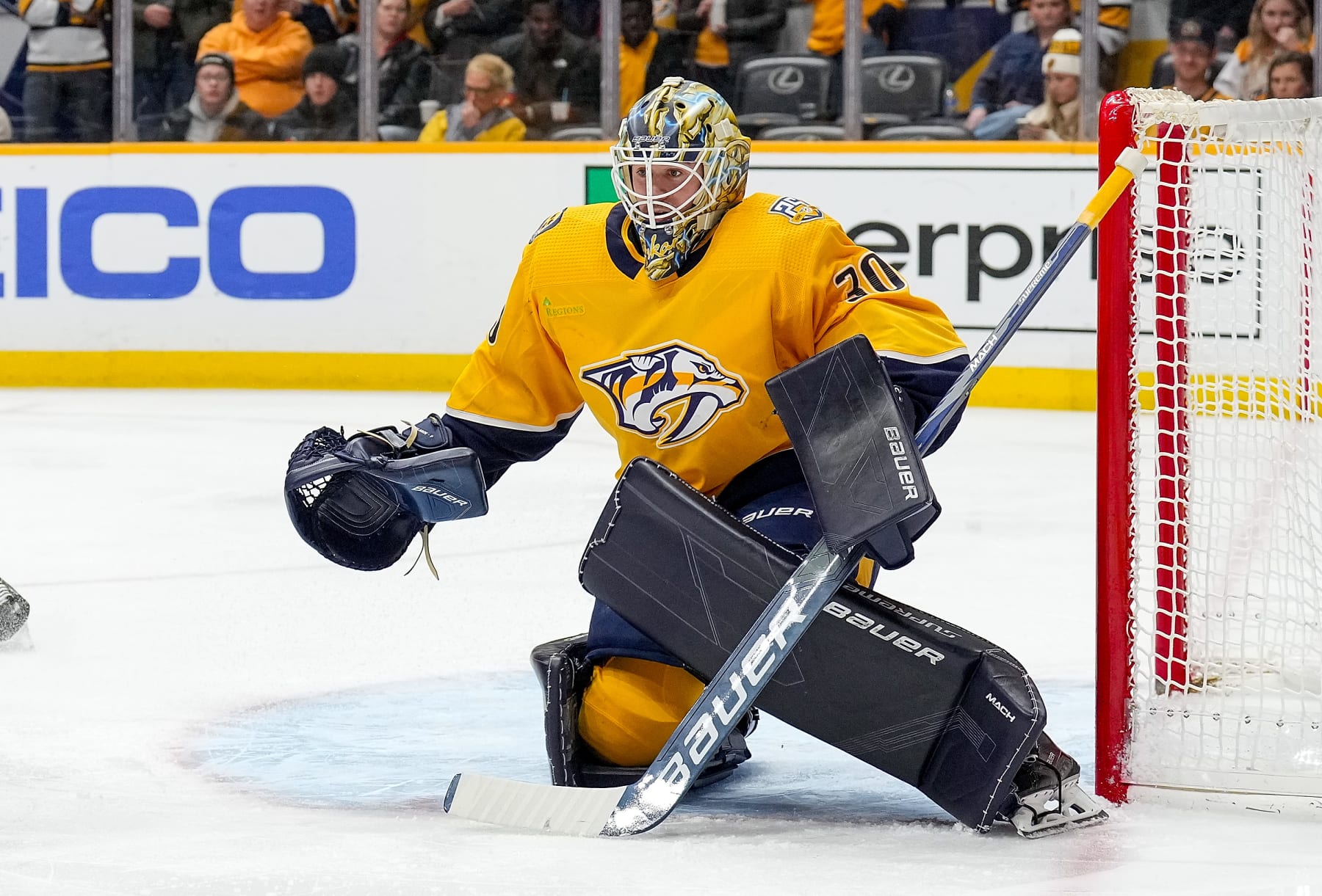 NASHVILLE, TENNESSEE - DECEMBER 27: Yaroslav Askarov #30 of the Nashville Predators tends net against the Carolina Hurricanes during an NHL game at Bridgestone Arena on December 27, 2023 in Nashville, Tennessee. (Photo by John Russell/NHLI via Getty Images)