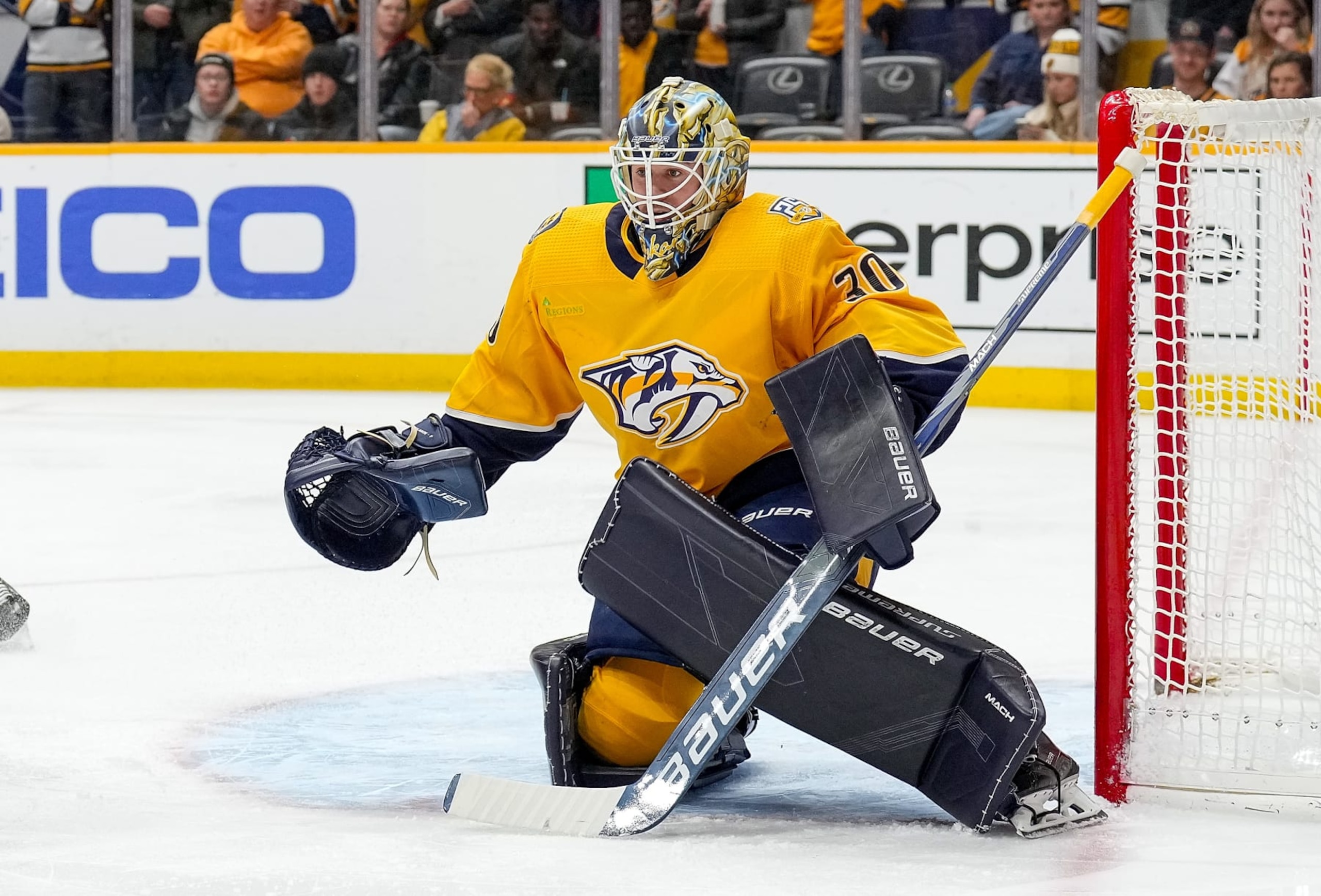 NASHVILLE, TENNESSEE - DECEMBER 27: Yaroslav Askarov #30 of the Nashville Predators tends net against the Carolina Hurricanes during an NHL game at Bridgestone Arena on December 27, 2023 in Nashville, Tennessee. (Photo by John Russell/NHLI via Getty Images)