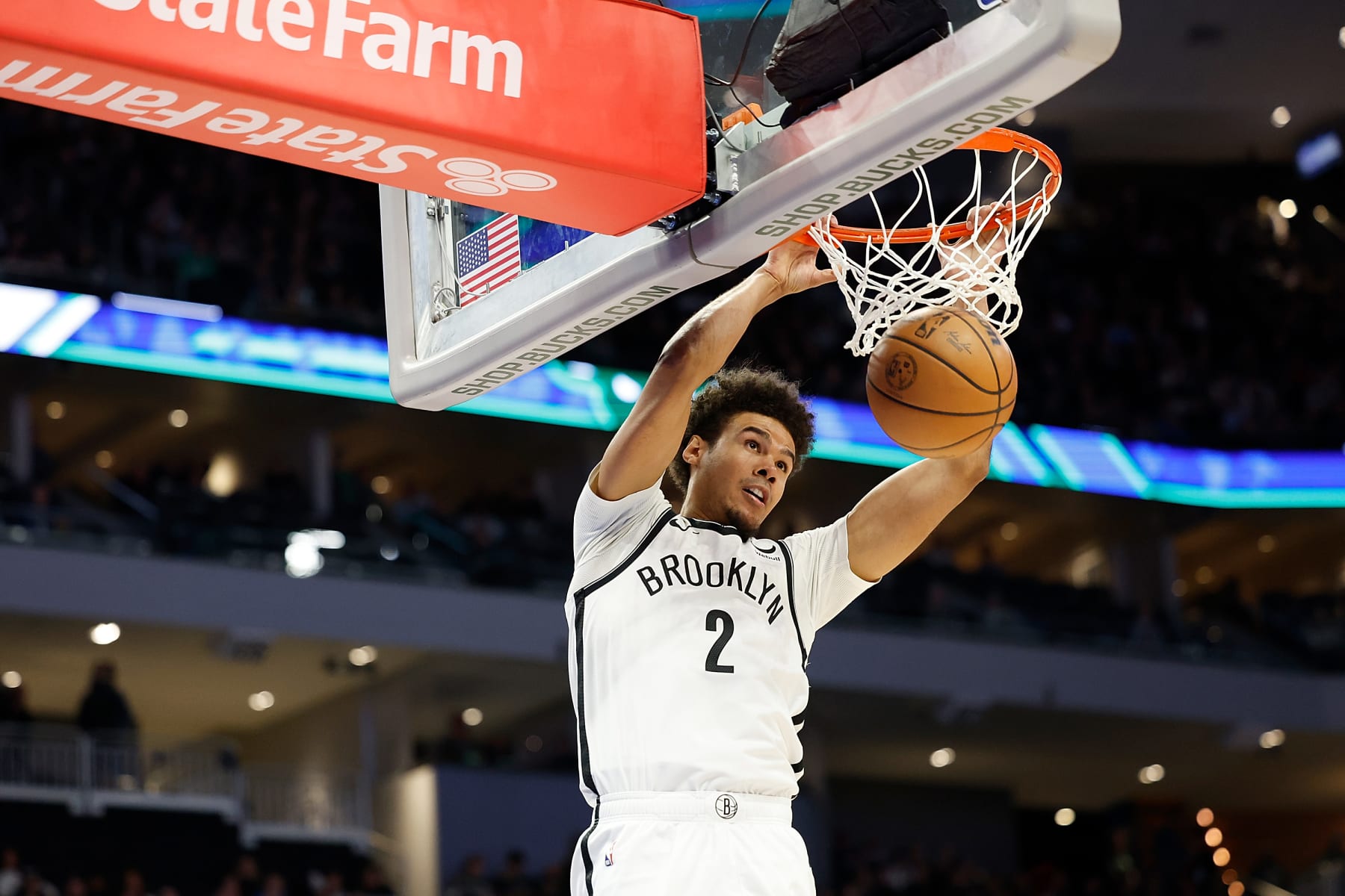 MILWAUKEE, WISCONSIN - MARCH 21: Cameron Johnson #2 of the Brooklyn Nets scores on a dunk during the second half of the game against the Milwaukee Bucks at Fiserv Forum on March 21, 2024 in Milwaukee, Wisconsin. NOTE TO USER: User expressly acknowledges and agrees that, by downloading and or using this photograph, User is consenting to the terms and conditions of the Getty Images License Agreement. (Photo by John Fisher/Getty Images)