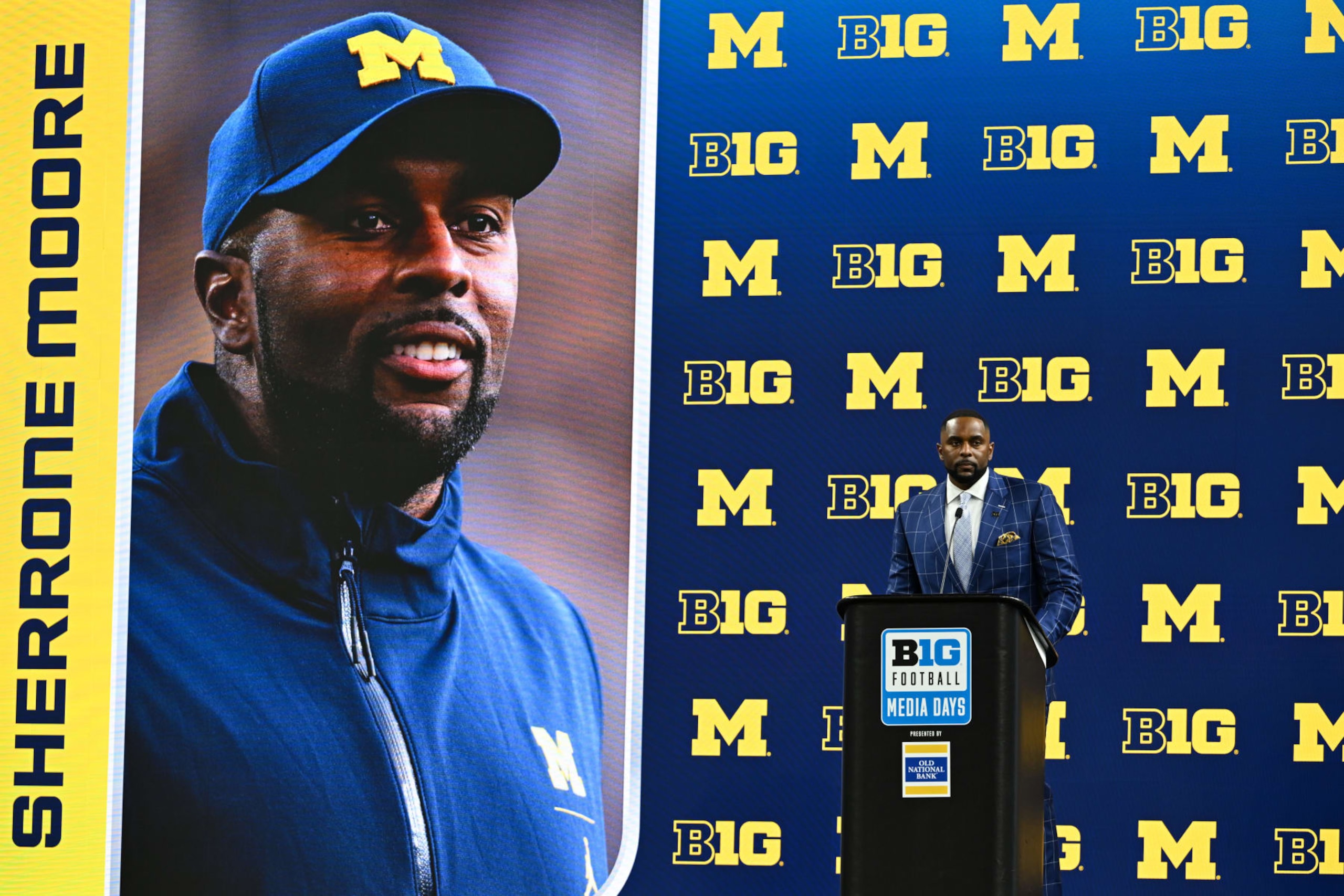 INDIANAPOLIS, IN - JULY 25: Michigan Wolverines Head Coach Sherrone Moore speaks during the 2024 Big Ten Media Days on July 25, 2024 at Lucas Oil Stadium in Indianapolis, IN. (Photo by James Black/Icon Sportswire via Getty Images)