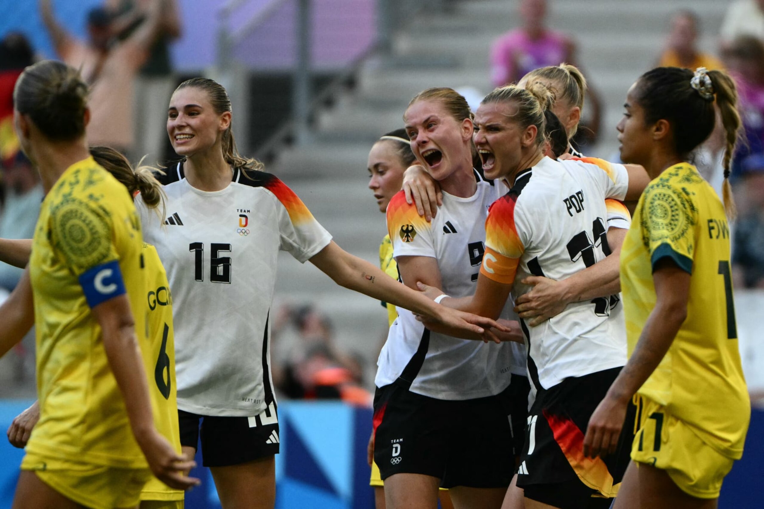 Germany's players celebrate their first goal during the women's group B football match between Germany and Australia during the Paris 2024 Olympic Games at the Marseille Stadium in Marseille on July 25, 2024. (Photo by Christophe SIMON / AFP) (Photo by CHRISTOPHE SIMON/AFP via Getty Images) Germany's players celebrate their first goal during the women's group B football match between Germany and Australia during the Paris 2024 Olympic Games at the Marseille Stadium in Marseille on July 25, 2024. (Photo by Christophe SIMON / AFP) (Photo by CHRISTOPHE SIMON/AFP via Getty Images)