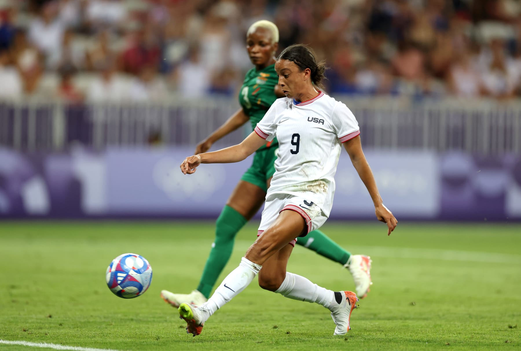 NICE, FRANCE - JULY 25: Mallory Swanson #9 of Team United States scores her team's second goal during the Women's group B match between United States and Zambia during the Olympic Games Paris 2024 at Stade de Nice on July 25, 2024 in Nice, France. (Photo by Marc Atkins/Getty Images)