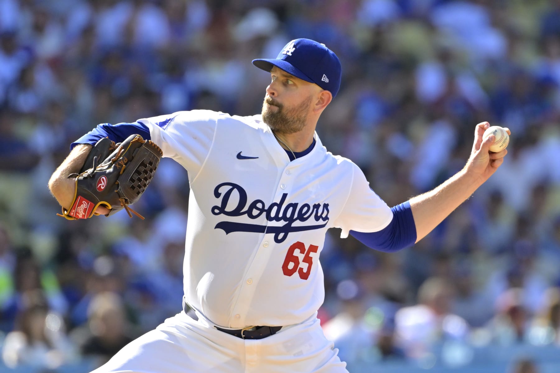 LOS ANGELES, CALIFORNIA - JULY 21: James Paxton #65 of the Los Angeles Dodgers pitches in the second inning against the Boston Red Sox at Dodger Stadium on July 21, 2024 in Los Angeles, California. (Photo by Jayne Kamin-Oncea/Getty Images)