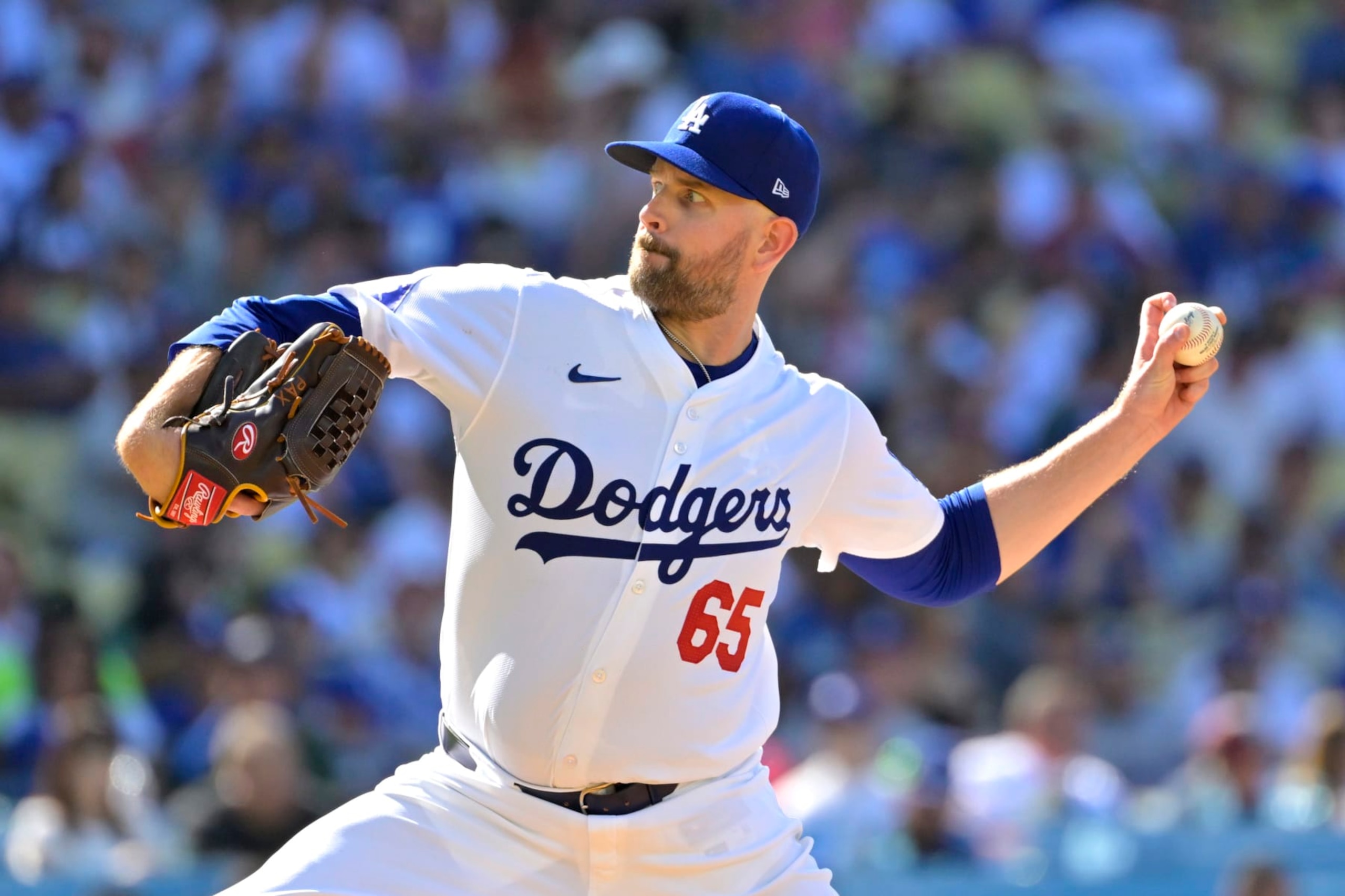 LOS ANGELES, CALIFORNIA - JULY 21: James Paxton #65 of the Los Angeles Dodgers pitches in the second inning against the Boston Red Sox at Dodger Stadium on July 21, 2024 in Los Angeles, California. (Photo by Jayne Kamin-Oncea/Getty Images)