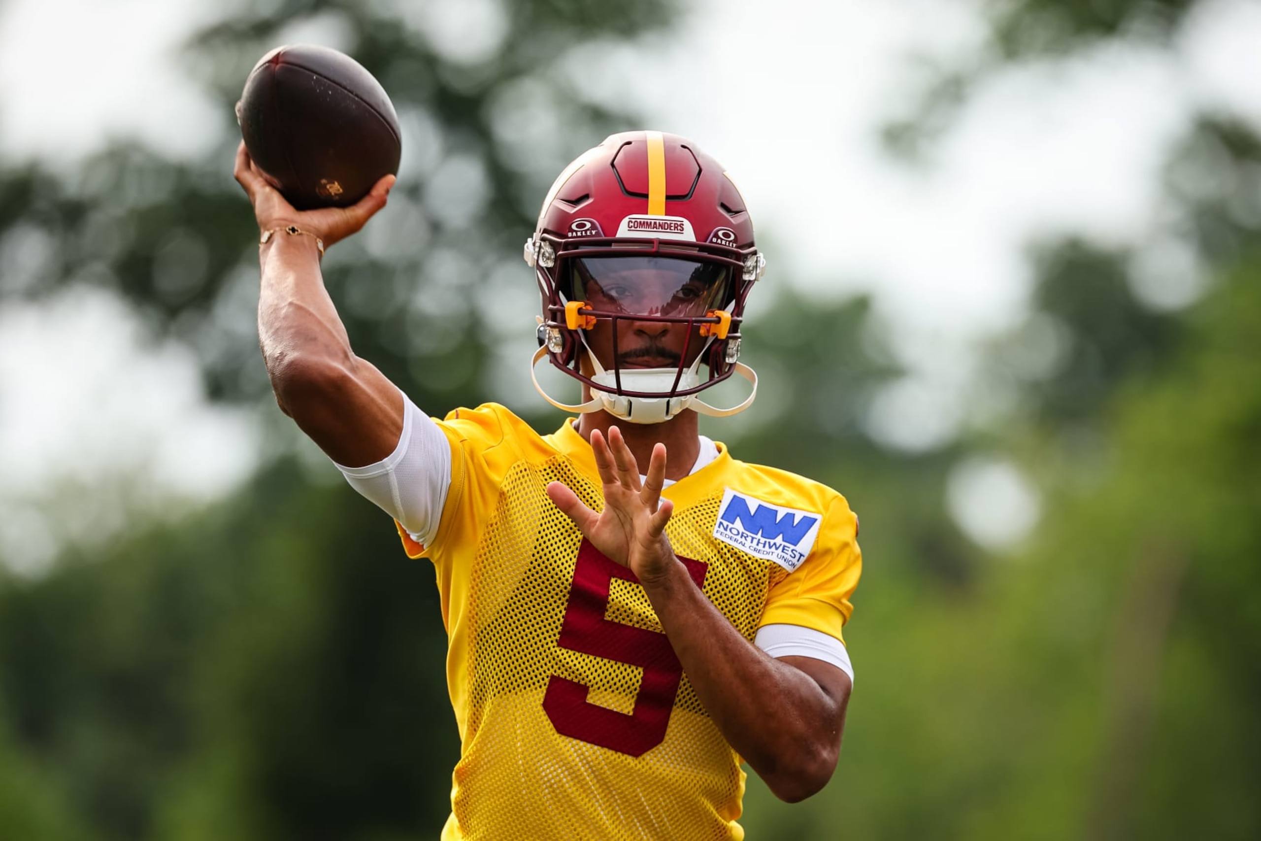 ASHBURN, VA - JULY 25: Jayden Daniels #5 of the Washington Commanders participates in a drill during training camp at OrthoVirginia Training Center at Commanders Park on July 25, 2024 in Ashburn, Virginia. (Photo by Scott Taetsch/Getty Images) ASHBURN, VA - JULY 25: Jayden Daniels #5 of the Washington Commanders participates in a drill during training camp at OrthoVirginia Training Center at Commanders Park on July 25, 2024 in Ashburn, Virginia. (Photo by Scott Taetsch/Getty Images)
