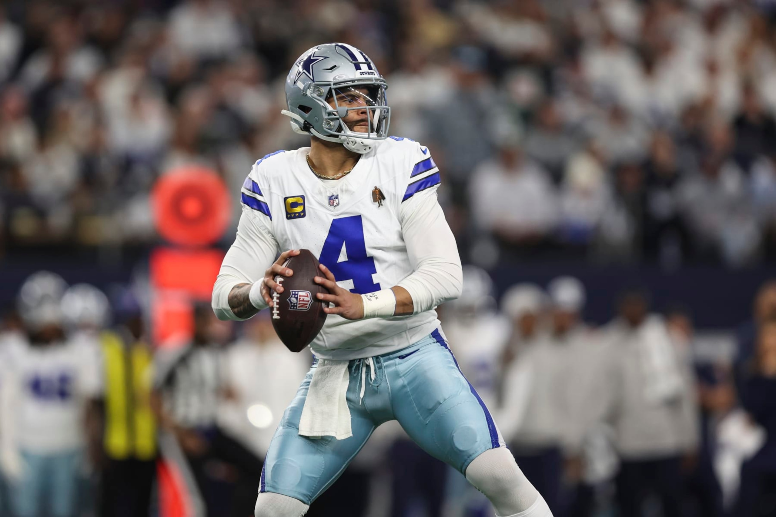 ARLINGTON, TX - JANUARY 14: Dak Prescott #4 of the Dallas Cowboys throws the ball during an NFL wild-card playoff football game against the Green Bay Packers at AT&T Stadium on January 14, 2024 in Arlington, Texas. (Photo by Perry Knotts/Getty Images)
