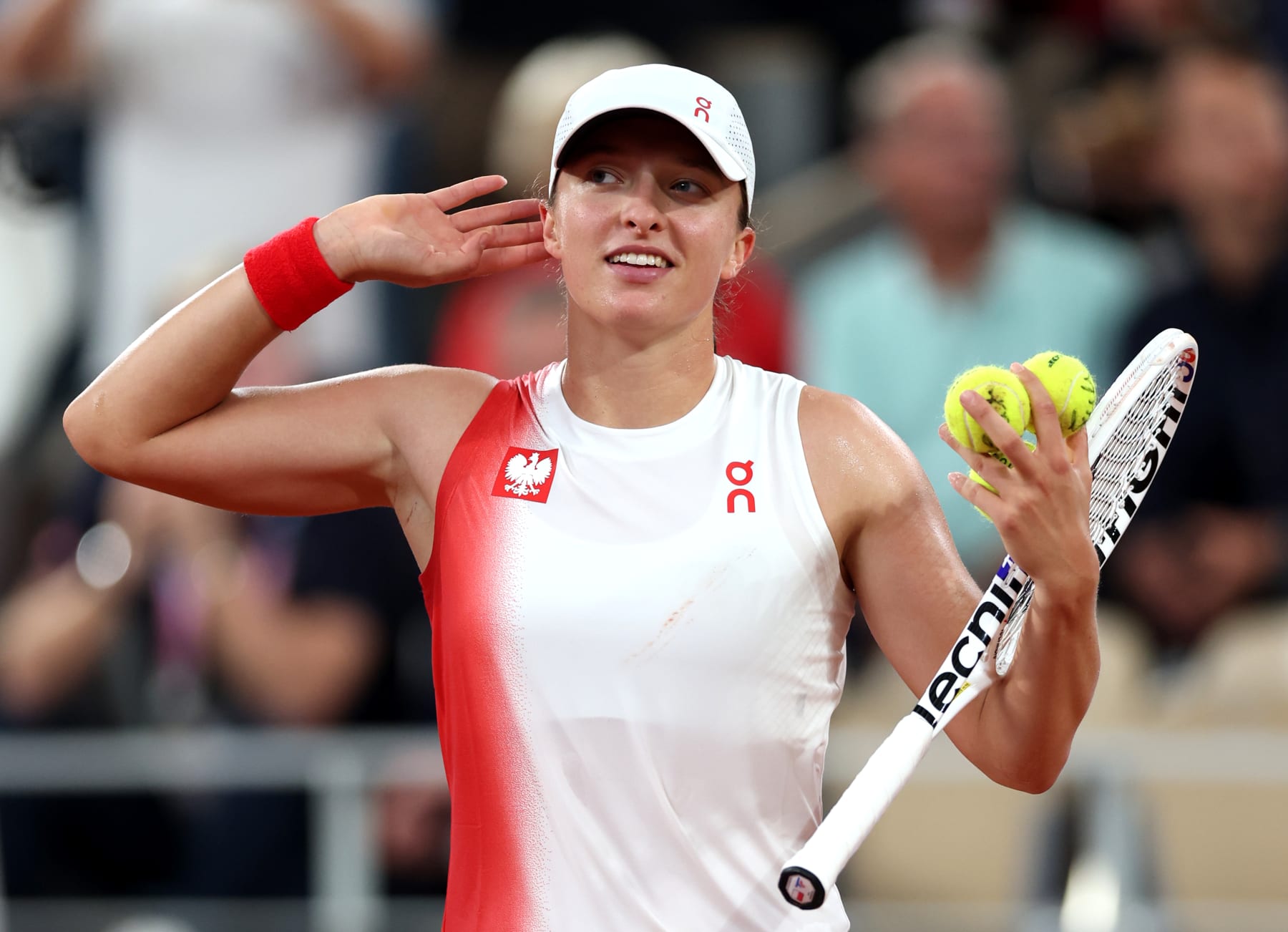 PARIS, FRANCE - JULY 27: Iga Swiatek of Team Poland celebrates victory against Irina-Camelia Bego of Team Romania during the Women's Singles First Round on day one of the Olympic Games Paris 2024 at Roland Garros on July 27, 2024 in Paris, France. (Photo by Matthew Stockman/Getty Images)