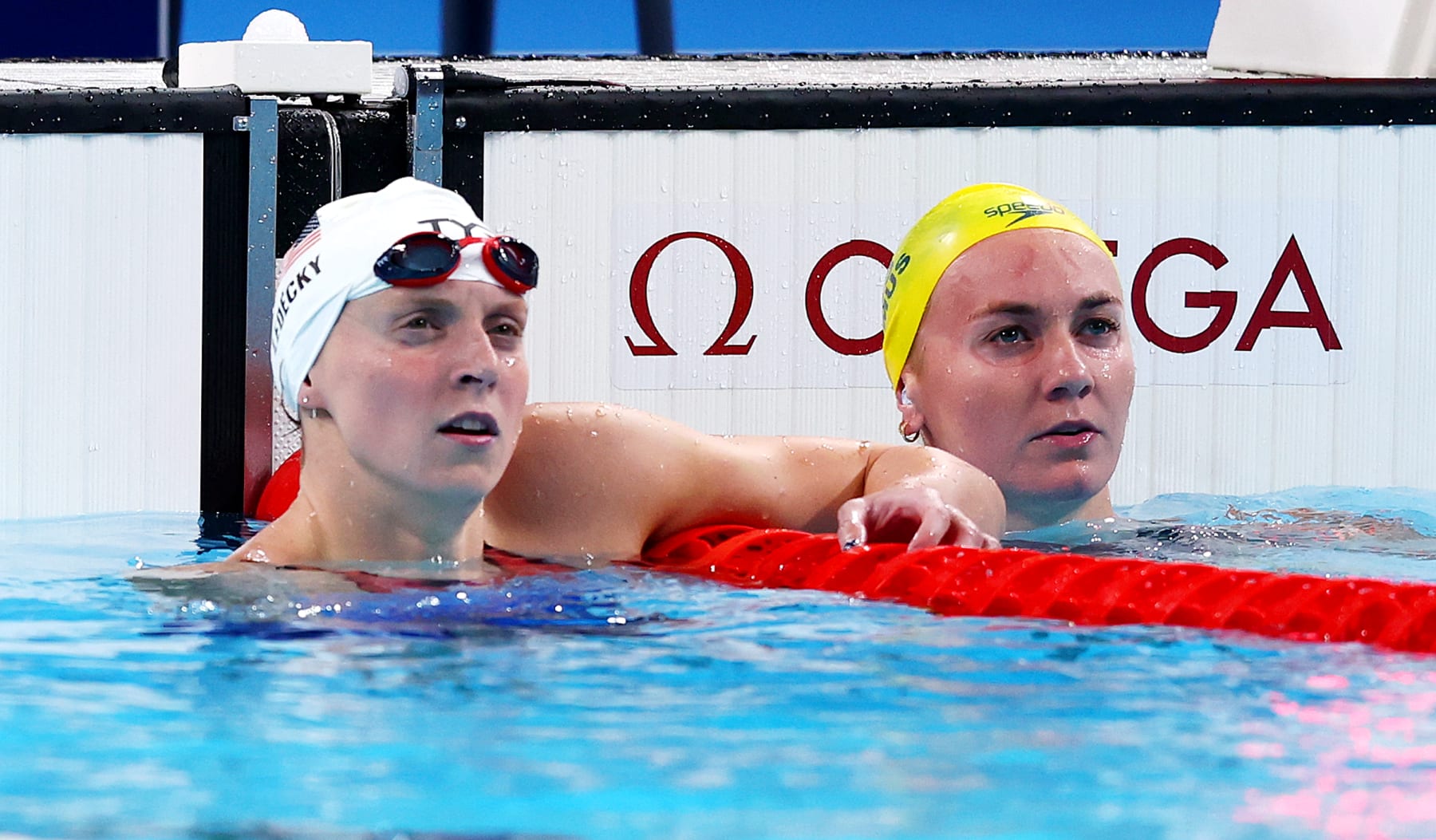NANTERRE, FRANCE - JULY 27: Katie Ledecky of Team United States and Ariarne Titmus of Team Australia react after competing in the Women's 400m Freestyle Heats on day one of the Olympic Games Paris 2024 at Paris La Defense Arena on July 27, 2024 in Nanterre, France. (Photo by Maddie Meyer/Getty Images)