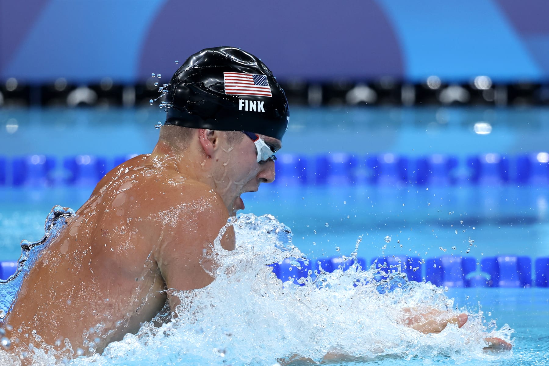 NANTERRE, FRANCE - JULY 27: Nic Fink of Team United States competes in the Men's 100m Breaststroke Semifinals on day one of the Olympic Games Paris 2024 at Paris La Defense Arena on July 27, 2024 in Nanterre, France. (Photo by Sarah Stier/Getty Images)