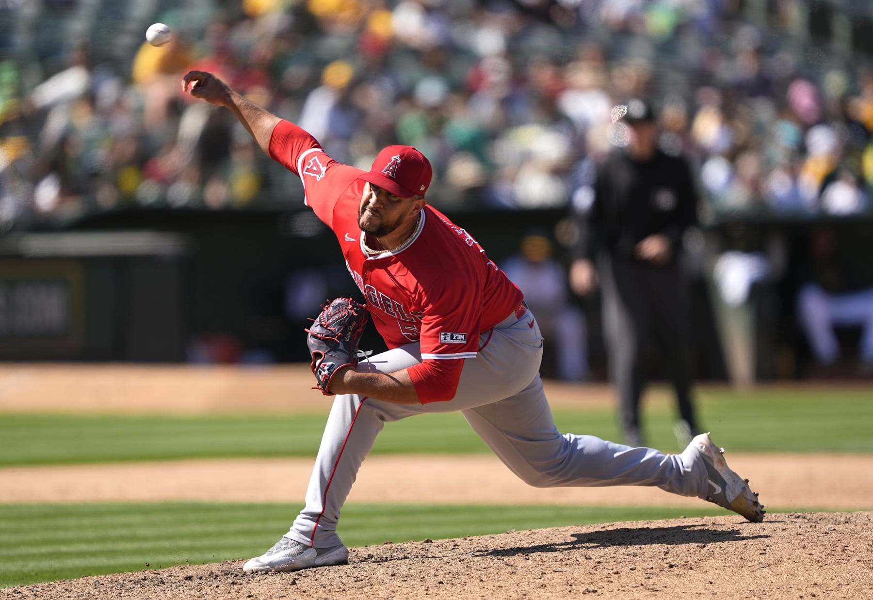 OAKLAND, CALIFORNIA - JULY 21: Carlos Estévez #53 of the Los Angeles Angels pitches against the Oakland Athletics in the bottom of the ninth inning on July 21, 2024 at the Oakland Coliseum in Oakland, California. (Photo by Thearon W. Henderson/Getty Images)