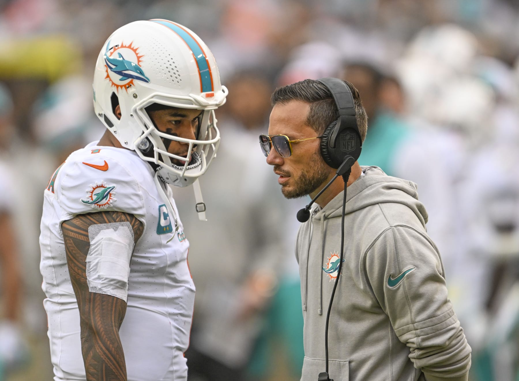 LANDOVER, MD -DECEMBER 3: Miami Dolphins quarterback Tua Tagovailoa (1) talks with head coach Mike McDaniel during third quarter action against the Washington Commanders at FedEx Field on December 3, 2023. (Photo by Jonathan Newton/The Washington Post via Getty Images)