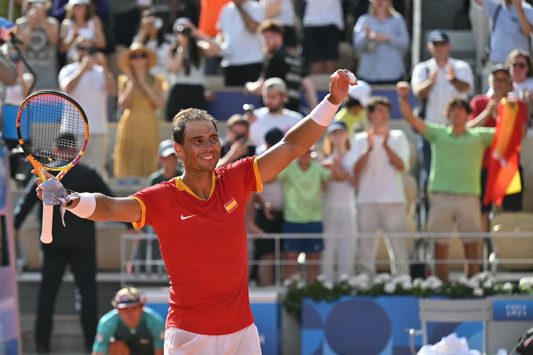 Spain's Rafael Nadal celebrates after beating Hungary's Marton Fucsovics in their men's singles first round tennis match on Court Philippe-Chatrier at the Roland-Garros Stadium at the Paris 2024 Olympic Games, in Paris on July 28, 2024. (Photo by Miguel MEDINA / AFP) (Photo by MIGUEL MEDINA/AFP via Getty Images)