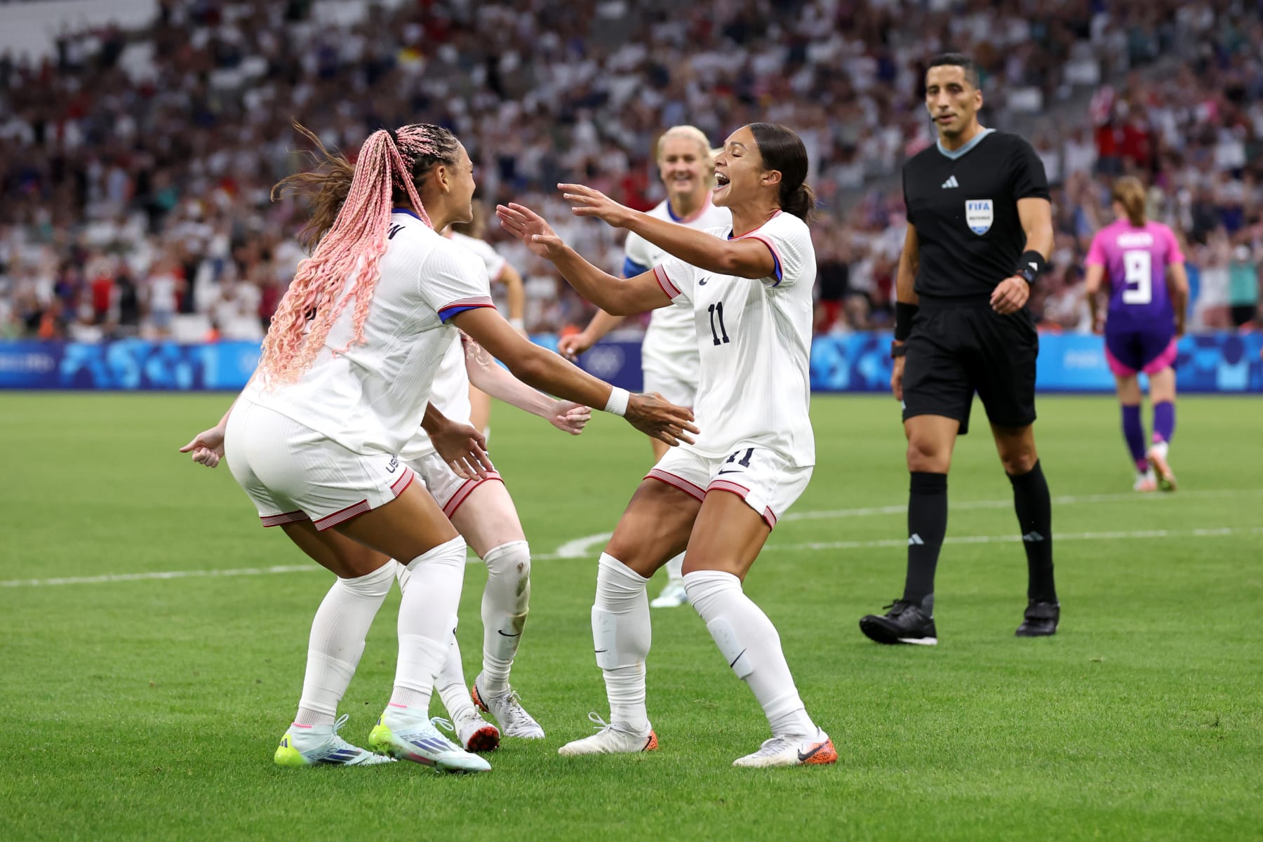 MARSEILLE, FRANCE - JULY 28: Sophia Smith #11 of Team United States celebrates scoring her team's first goal during the Women's group B match between United States and Germany during the Olympic Games Paris 2024 at Stade de Marseille on July 28, 2024 in Marseille, France. (Photo by Alex Livesey/Getty Images)