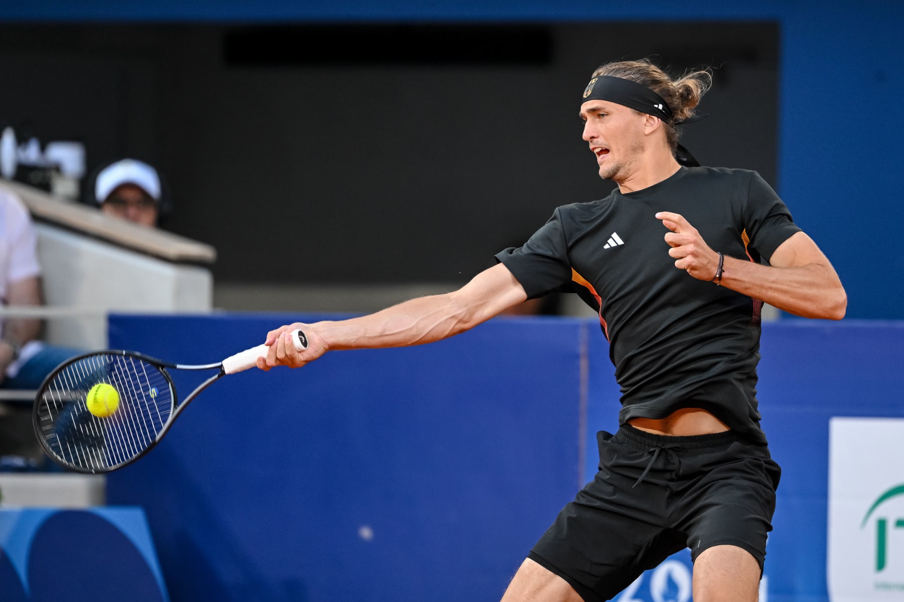 Alexander Zverev of Germany controls the Ball during the Men's Singles First Round match between Alexander Zverev of Germany and Jaume Munar of Spain on Day 2 of the Olympic Games Paris 2024 at Roland-Garros Stadium on July 28, 2024 in Paris, France. (Photo by Harry Langer/DeFodi Images via Getty Images)