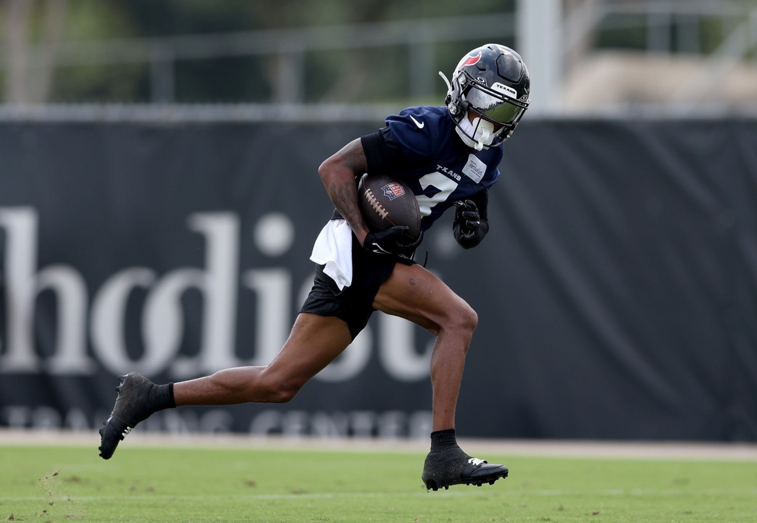 HOUSTON, TEXAS - JUNE 04: Tank Dell #3 of the Houston Texans runs after a catch during Mandatory Minicamp at Houston Methodist Training Center on June 04, 2024 in Houston, Texas. (Photo by Tim Warner/Getty Images) HOUSTON, TEXAS - JUNE 04: Tank Dell #3 of the Houston Texans runs after a catch during Mandatory Minicamp at Houston Methodist Training Center on June 04, 2024 in Houston, Texas. (Photo by Tim Warner/Getty Images)