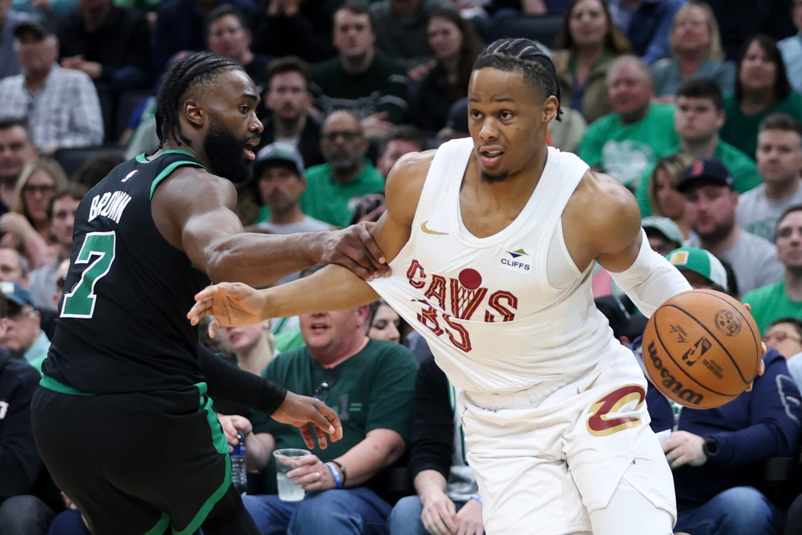 BOSTON, MASSACHUSETTS - MAY 15: Isaac Okoro #35 of the Cleveland Cavaliers is fouled by Jaylen Brown #7 of the Boston Celtics during the third quarter in Game Five of the Eastern Conference Second Round Playoffs at TD Garden on May 15, 2024 in Boston, Massachusetts. NOTE TO USER: User expressly acknowledges and agrees that, by downloading and or using this photograph, User is consenting to the terms and conditions of the Getty Images License Agreement. (Photo by Adam Glanzman/Getty Images)
