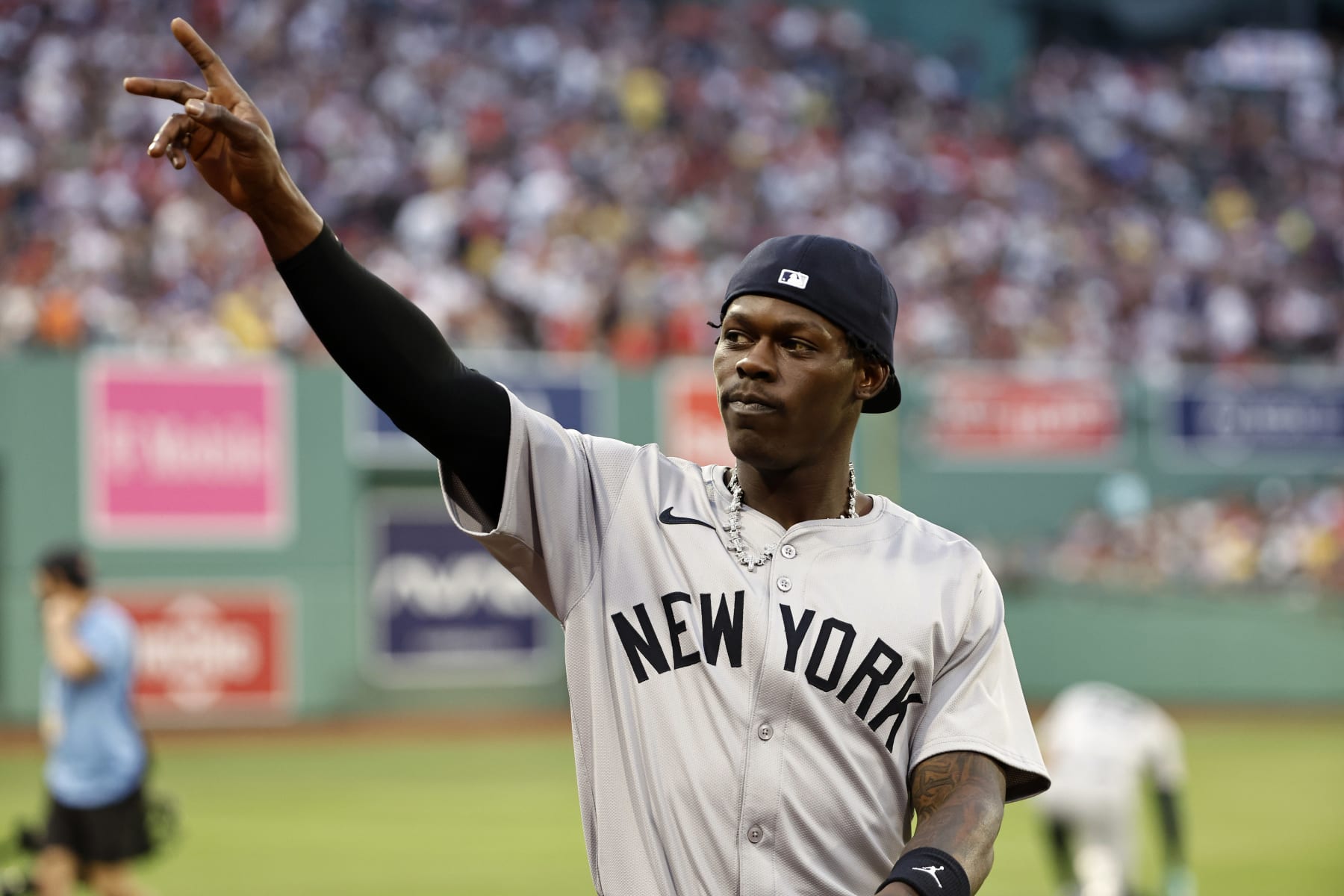 BOSTON, MA - JULY 28: Jazz Chisholm Jr. #13 of the New York Yankees waves to fans before their game against the Boston Red Sox at Fenway Park on July 28, 2024 in Boston, Massachusetts. Chisholm, recently acquired on July 27, 2024 by the Yankees via a trade with the Miami Marlins, will play in his first game as a Yankee. (Photo By Winslow Townson/Getty Images)
