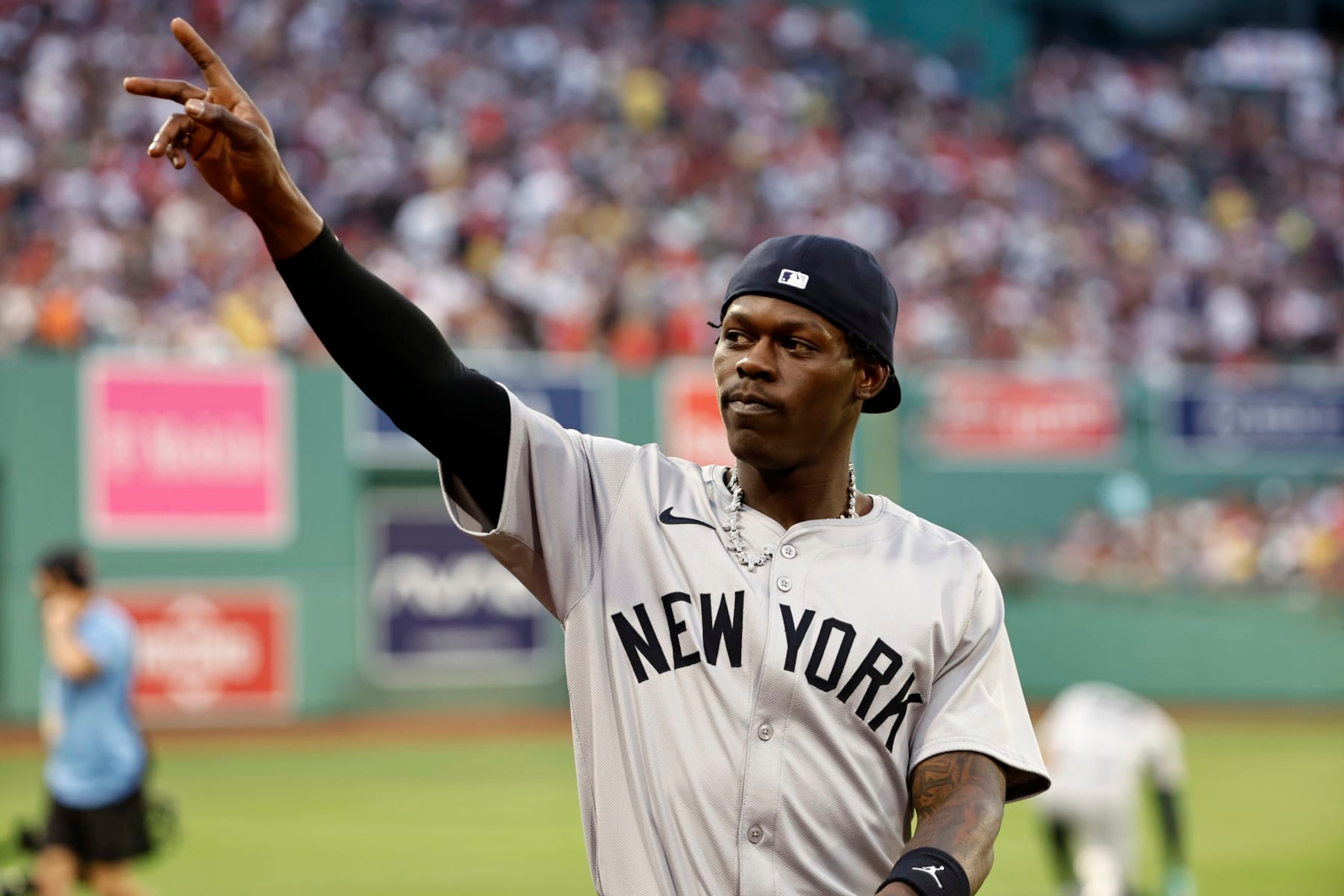 BOSTON, MA - JULY 28: Jazz Chisholm Jr. #13 of the New York Yankees waves to fans before their game against the Boston Red Sox at Fenway Park on July 28, 2024 in Boston, Massachusetts. Chisholm, recently acquired on July 27, 2024 by the Yankees via a trade with the Miami Marlins, will play in his first game as a Yankee. (Photo By Winslow Townson/Getty Images)