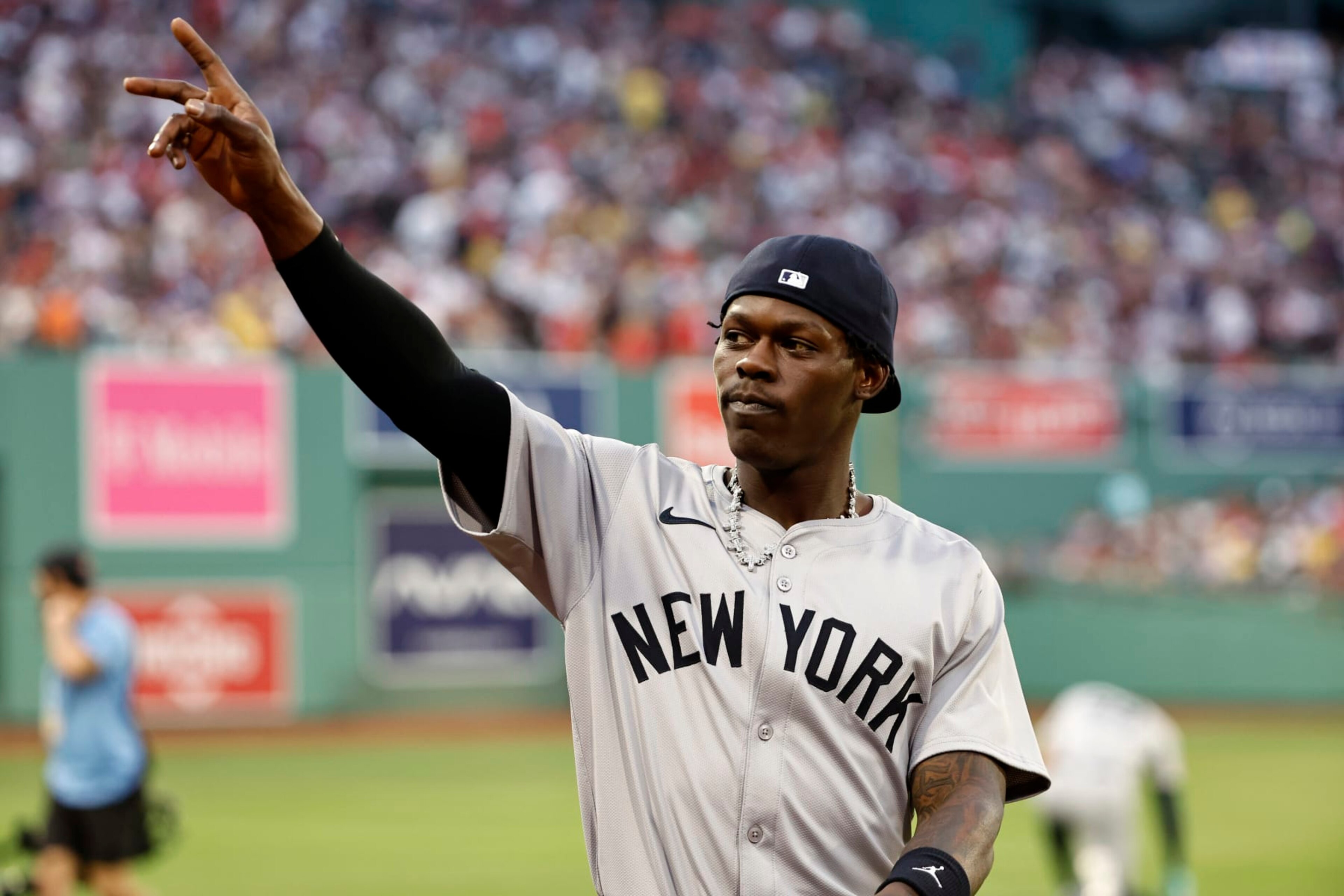 BOSTON, MA - JULY 28: Jazz Chisholm Jr. #13 of the New York Yankees waves to fans before their game against the Boston Red Sox at Fenway Park on July 28, 2024 in Boston, Massachusetts. Chisholm, recently acquired on July 27, 2024 by the Yankees via a trade with the Miami Marlins, will play in his first game as a Yankee. (Photo By Winslow Townson/Getty Images) BOSTON, MA - JULY 28: Jazz Chisholm Jr. #13 of the New York Yankees waves to fans before their game against the Boston Red Sox at Fenway Park on July 28, 2024 in Boston, Massachusetts. Chisholm, recently acquired on July 27, 2024 by the Yankees via a trade with the Miami Marlins, will play in his first game as a Yankee. (Photo By Winslow Townson/Getty Images)