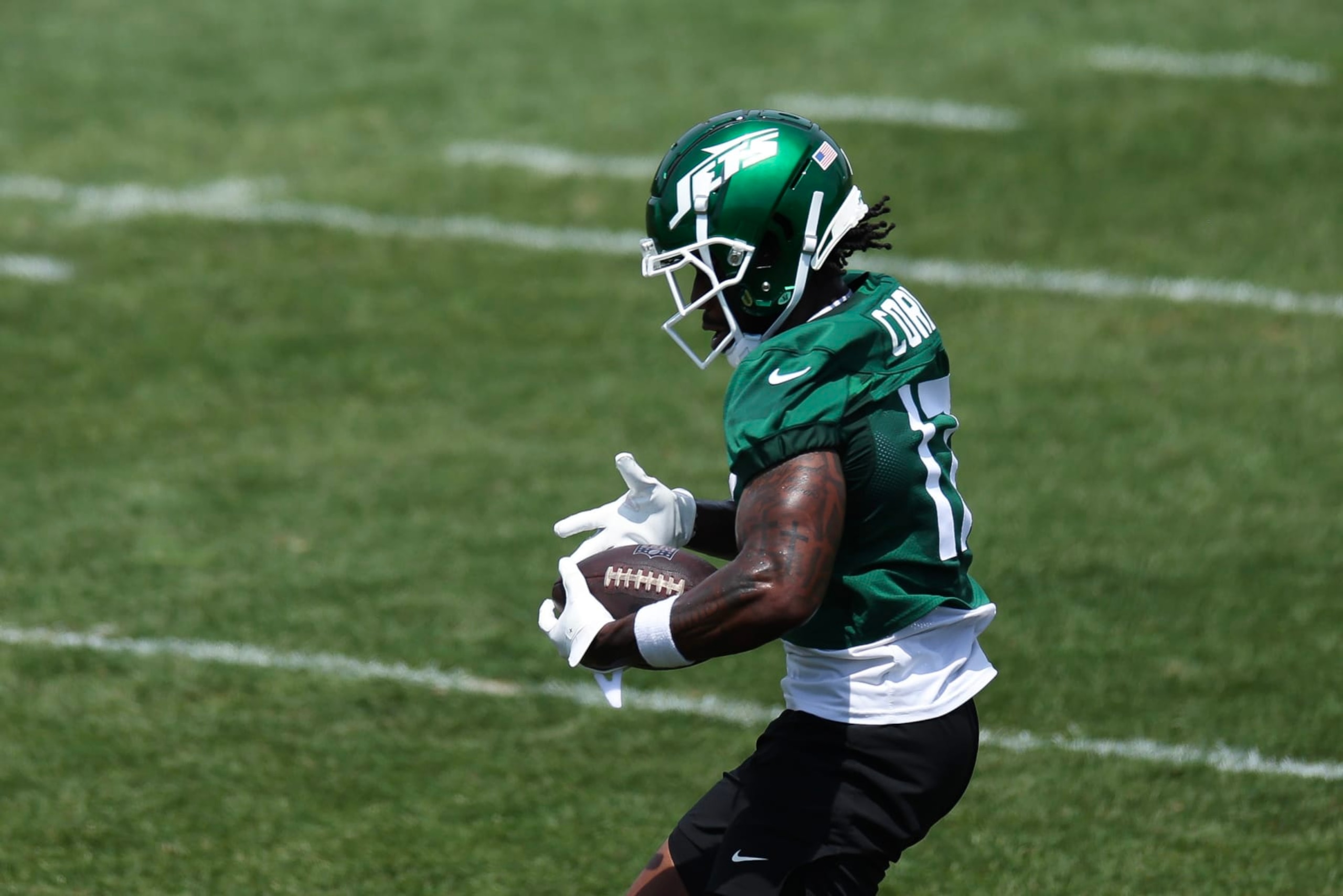 FLORHAM PARK, NEW JERSEY - JUNE 04: Malachi Corley #17 of the New York Jets participates in drills during New York Jets OTA Offseason Workouts at Atlantic Health Jets Training Center on June 04, 2024 in Florham Park, New Jersey.  (Photo by Luke Hales/Getty Images)