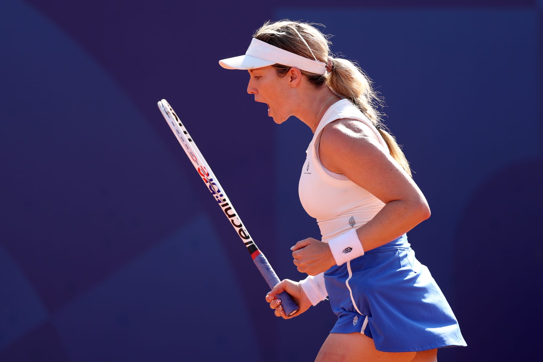 PARIS, FRANCE - JULY 29: Danielle Collins of Team United States reacts against Caroline Wozniacki of Team Denmark of China during the Women's Singles second round match on day three of the Olympic Games Paris 2024 at Roland Garros on July 29, 2024 in Paris, France. (Photo by Matthew Stockman/Getty Images)