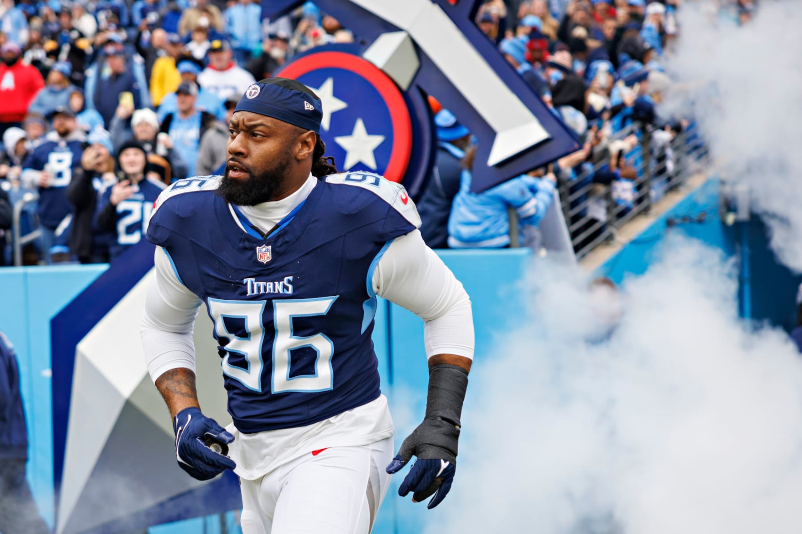 NASHVILLE TENNESSEE - JANUARY 07: Denico Autry #96 of the Tennessee Titans during introductions before the game against the Jacksonville Jaguars in Nashville, Tennessee at Nissan Stadium on January 7, 2024 in Houston, Texas. The Titans defeated the Jaguars 28-20.  (Photo by Wesley Hitt/Getty Images)