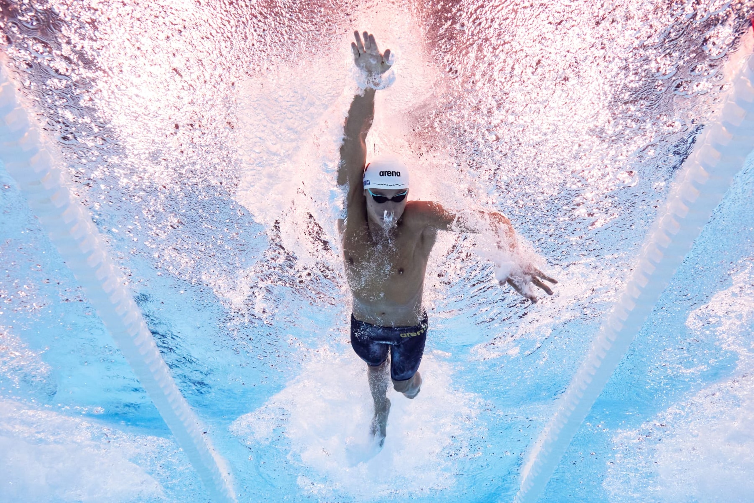 NANTERRE, FRANCE - JULY 28: (EDITORS NOTE: Image was captured using an underwater robotic camera.) David Popovici of Team Romania competes in the Men 200m Freestyle Semifinal on day two of the Olympic Games Paris 2024 at Paris La Defense Arena on July 28, 2024 in Nanterre, France. (Photo by Adam Pretty/Getty Images) NANTERRE, FRANCE - JULY 28: (EDITORS NOTE: Image was captured using an underwater robotic camera.) David Popovici of Team Romania competes in the Men 200m Freestyle Semifinal on day two of the Olympic Games Paris 2024 at Paris La Defense Arena on July 28, 2024 in Nanterre, France. (Photo by Adam Pretty/Getty Images)
