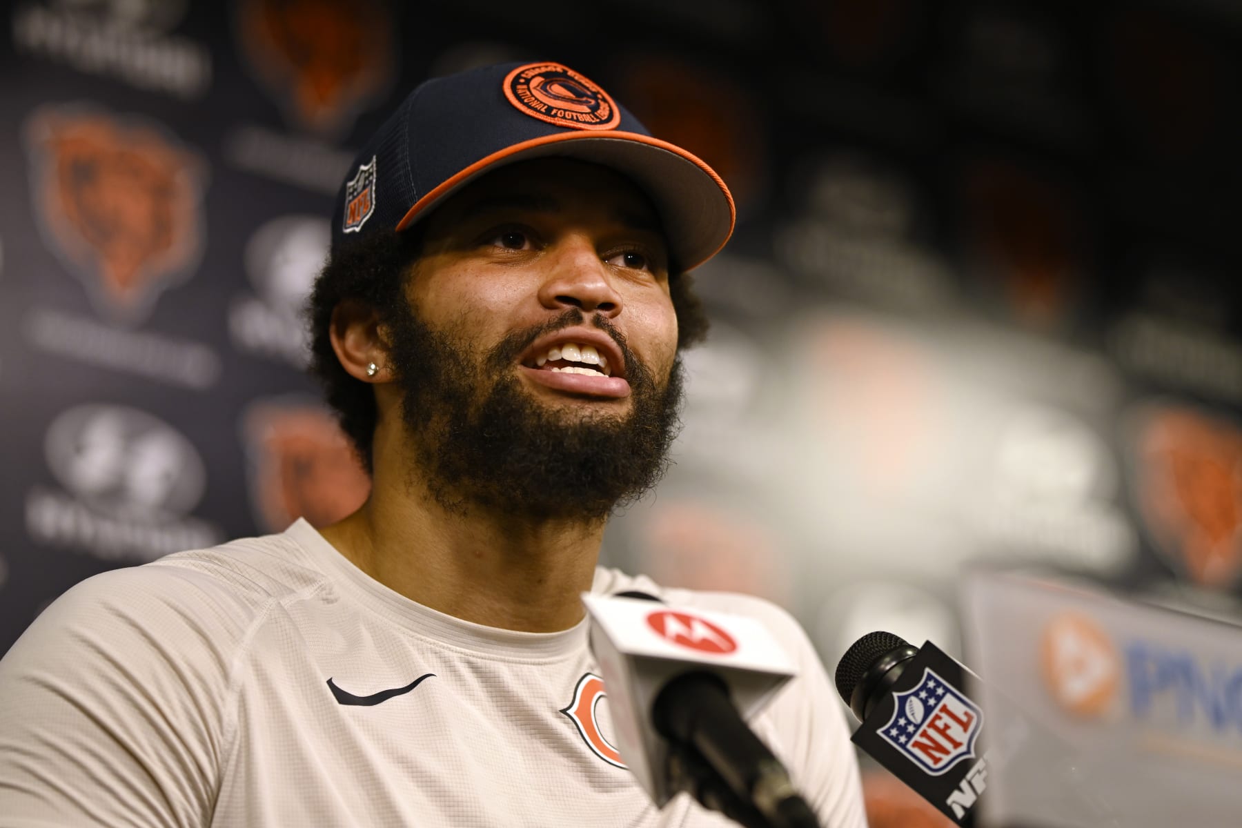 LAKE FOREST, ILLINOIS - JUNE 06: Caleb Williams #18 of the Chicago Bears speaks during a new conference after the Chicago Bears mandatory minicamp at Halas Hall on June 06, 2024 in Lake Forest, Illinois. (Photo by Quinn Harris/Getty Images)