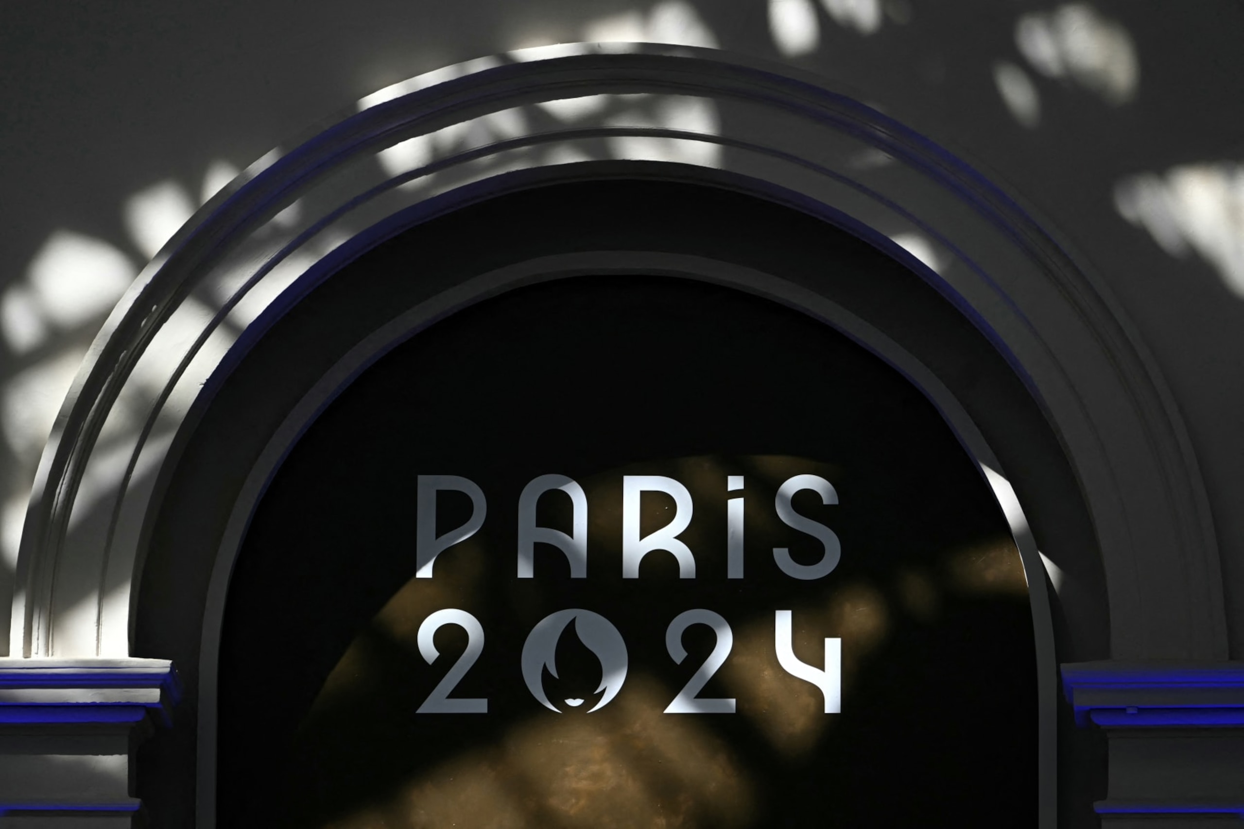 The Paris 2024 logo is seen during fencing competitions of the Paris 2024 Olympic Games at the Grand Palais in Paris, on July 28, 2024. (Photo by Fabrice COFFRINI / AFP) (Photo by FABRICE COFFRINI/AFP via Getty Images)